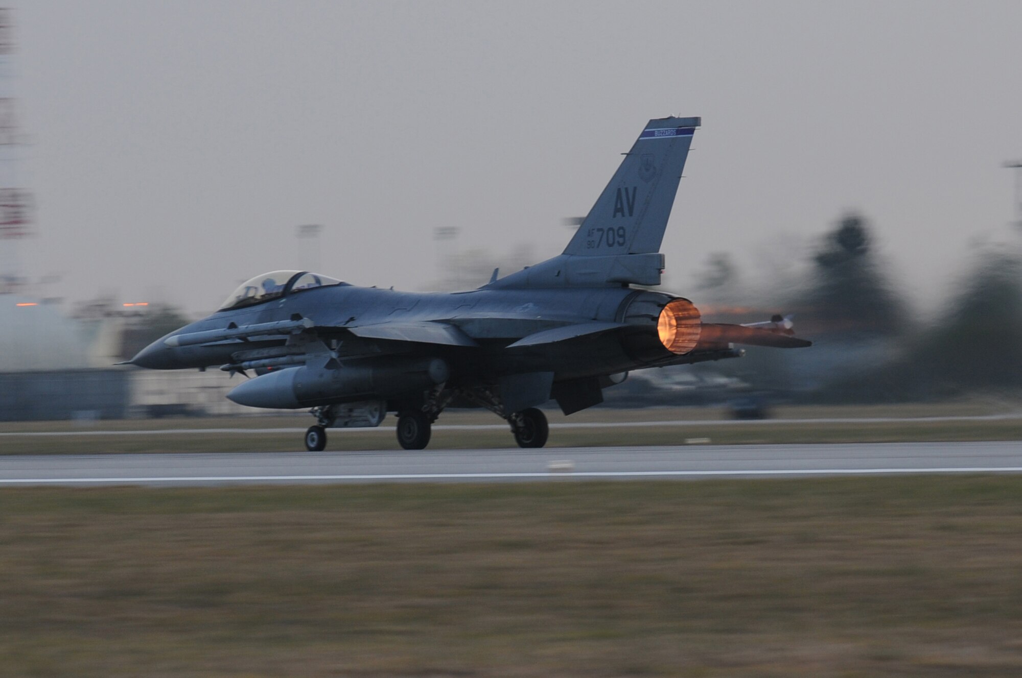 An F-16 Fighting Falcon lands on the flight line after flying a sortie mission during a surge, Dec. 16, 2009 at Aviano Air Base, Italy. The 31st Fighter Wing conducted the surge is to test sortie production capability; allowing the wing to test its support functions to the limits, simulate pilot's war-time flying rates, and helped plus up flying hours and sorties. 

(U.S. Air Force photo/ Senior Airman Nadine Y. Barclay)
