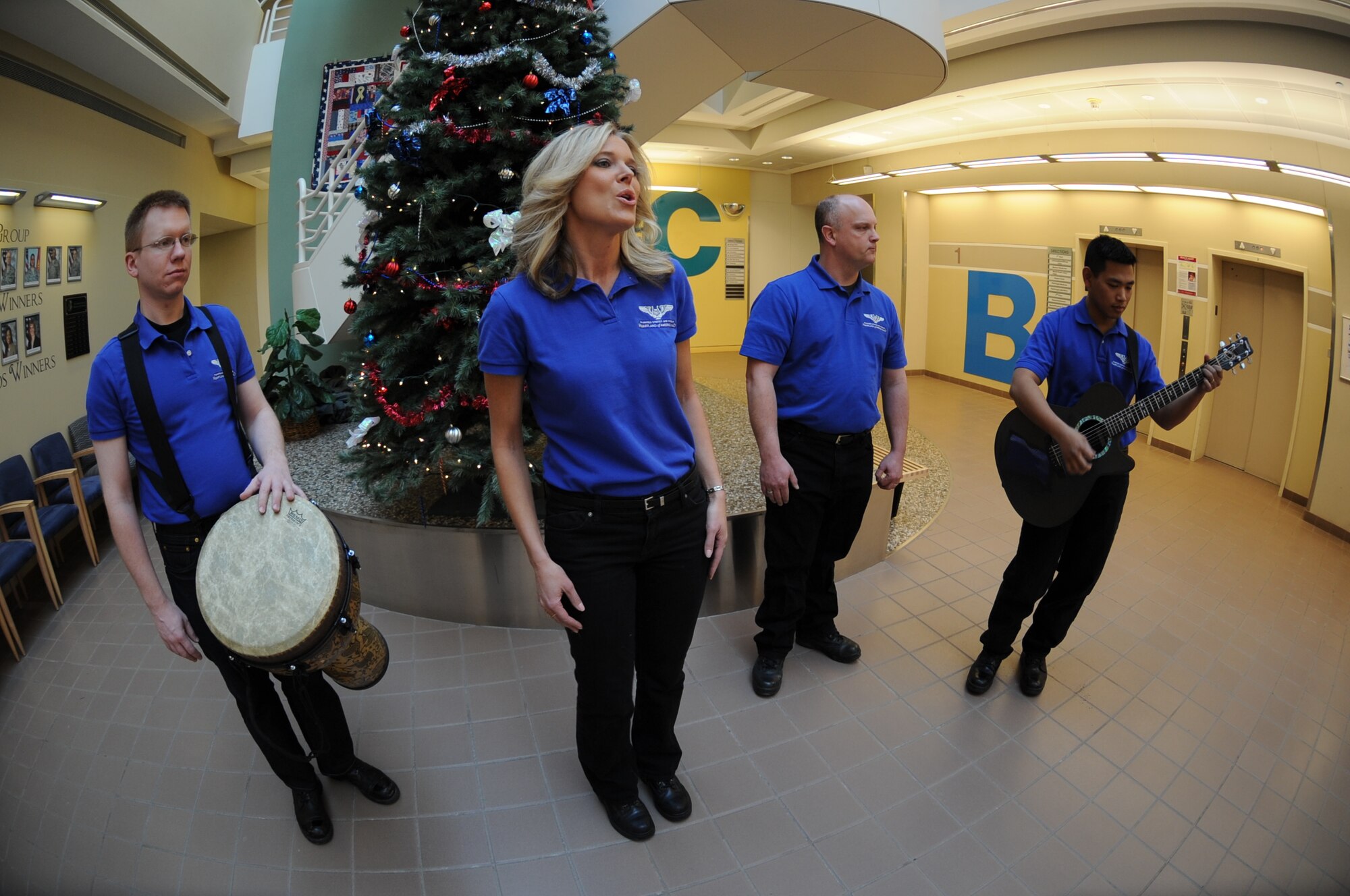 MINOT AIR FORCE BASE, N.D. -- Night Wing performs holiday songs during a visit here Dec. 16. Night Wing is part of the United States Air Force Heartland of America Band that provides innovative and professional music to global audiences. (U.S. Air Force photo by Senior Airman Sharida Jackson)