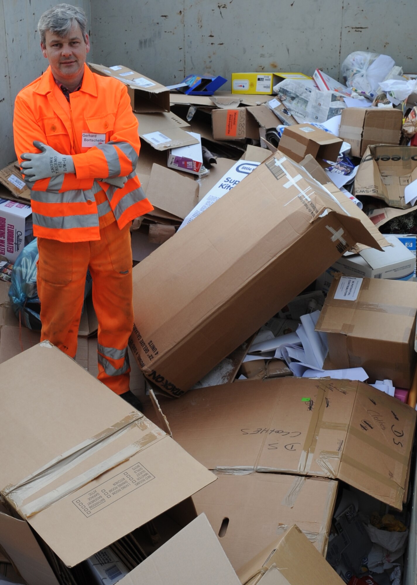 Mr. Gerhard Bortscheller, Kaiserslautern Military Community Recycle Center, poses for a photo while working hard on a daily basis to help keep the environment clean, Ramstein Air Base, Germany, Dec. 18, 2009.  The recycle center is only for the use of on-base residents. (U.S. Air Force photo by Airman 1st Class Caleb Pierce)  