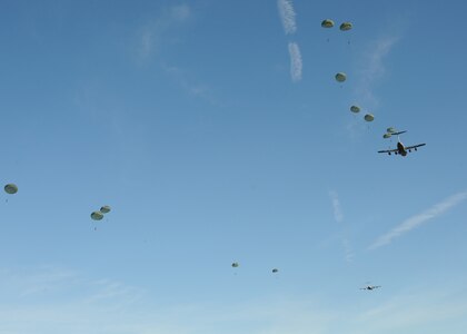 Airborne Soldiers from the 2-319th Airborne Field Artillery, 82nd Airborne Division, Ft. Bragg, N.C., were airdropped during a strategic brigade airdrop exercise over North Auxiliary Airfield near Northern, S.C., Dec. 16. 2009. The Soldiers were airdropped along with cargo pallets at the North Auxiliary Airfield. The training mission also included aerial refueling training and simulated aeromedical evacuation. (U.S. Air Force photo/Senior Airman Katie Gieratz)(Released)