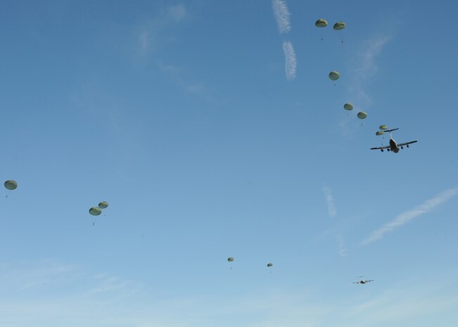 Airborne Soldiers from the 2-319th Airborne Field Artillery, 82nd Airborne Division, Ft. Bragg, N.C., were airdropped during a strategic brigade airdrop exercise over North Auxiliary Airfield near Northern, S.C., Dec. 16. 2009. The Soldiers were airdropped along with cargo pallets at the North Auxiliary Airfield. The training mission also included aerial refueling training and simulated aeromedical evacuation. (U.S. Air Force photo/Senior Airman Katie Gieratz)(Released)
