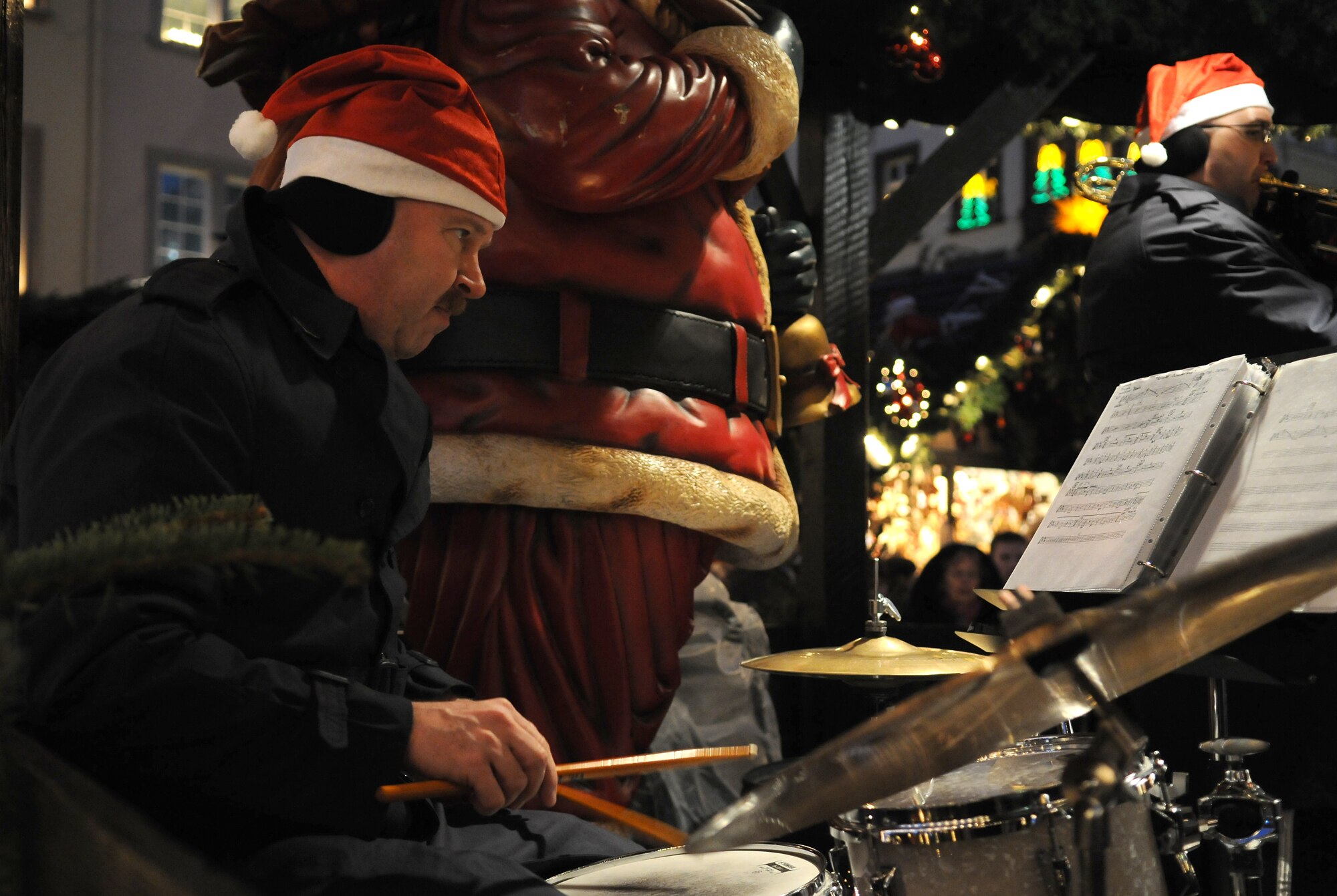 TRIER, Germany -- Master Sgt. James Bartelt, U.S. Air Forces in Europe Band drummer, plays “Winter Wonderland” during a live performance by Five Star Brass Dec. 17 at the Trier Christmas Market. The band entertained crowds of all ages with holiday songs during the concert. (U.S. Air Force photo/Airman 1st Class Nathanael Callon)