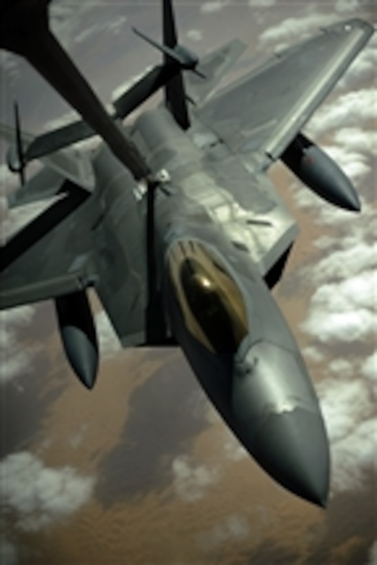 A U.S. Air Force F-22 Raptor aircraft is refueled by a KC-10A Extender aircraft with the 908th Expeditionary Air Refueling Squadron in southwest Asia on Dec. 9, 2009.  The F-22 fighters and crews are deployed from the 27th Fighter Squadron at Langley Air Force Base, Va.  Aircrews from France, Jordan, Pakistan, the U.A.E., the U.K. and the U.S. are training together in the Air Forces Central area of responsibility.  