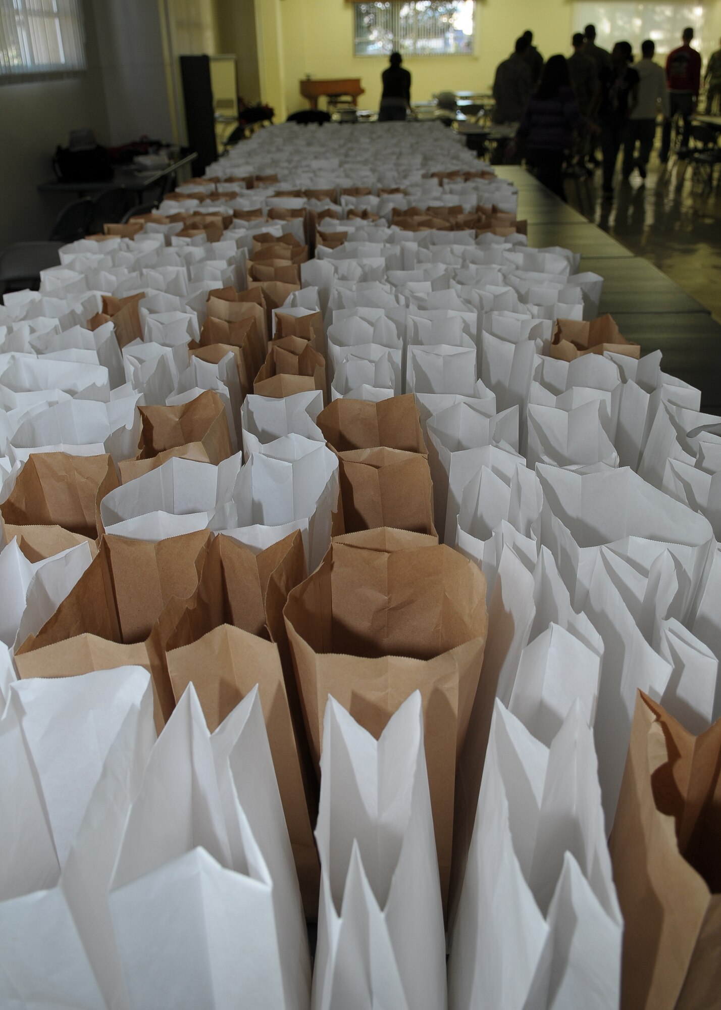 YOKOTA AIR BASE, Japan -- More than 3,000 cookies were donated, bagged and distributed during the Yokota Enlisted Spouses Club Cookie Crunch event this year.  The cookies were delivered to Airmen living in the dormitories. (U.S. Air Force photo/Airman 1st Class Sean Martin)