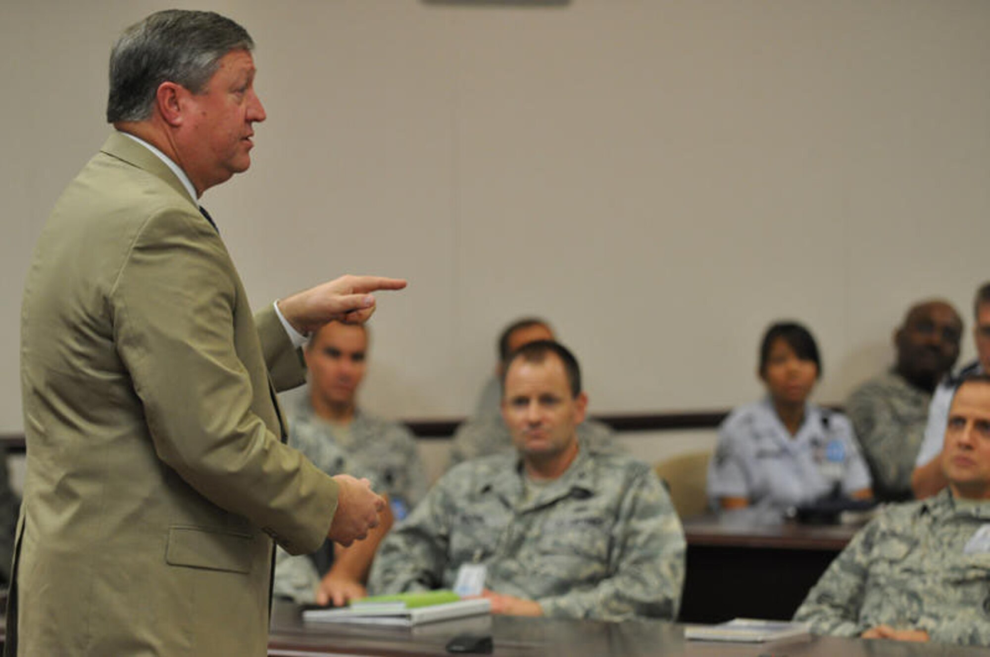 CAMP SMITH, Hawaii - Secretary of the Air Force Michael Donley explains the Air Force's future with deployments, recapitalization and budget to Airmen while at the Nimitz-MacArthur Pacific Command Center at Camp H. M. Smith, Hawaii on Dec. 18. Sec. Donley is conducting a trip through the Pacific region to visit Airmen and see how they are doing and Hawaii was his first stop. He will visit Kadena, Yokota, Guam, Kunsan and Osan Air Bases duringthis trip. (DoD photo by U.S.  Air Force Tech Sgt. Cohen A. Young)