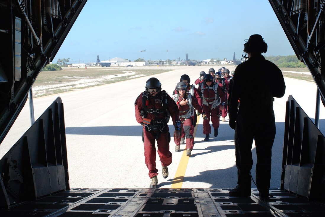 Key West, Fla. - Air Force Reserve Pararescuemen, or PJs, from the 920th RQW, along with their Canadian counterparts, SARTechs, load up in an HC-130/N for their high altitude-low opening jumps during the 2009 Key West SAREX. These jump missions, at altitudes up to 35,000 feet, are part of the Combat Search and Rescue (CSAR) missions the PJs perform. They free fall for about 2,500 feet before they deploy their parachute. (U.S. Air Force Photo/Staff. Sgt. Leslie Kraushaar)