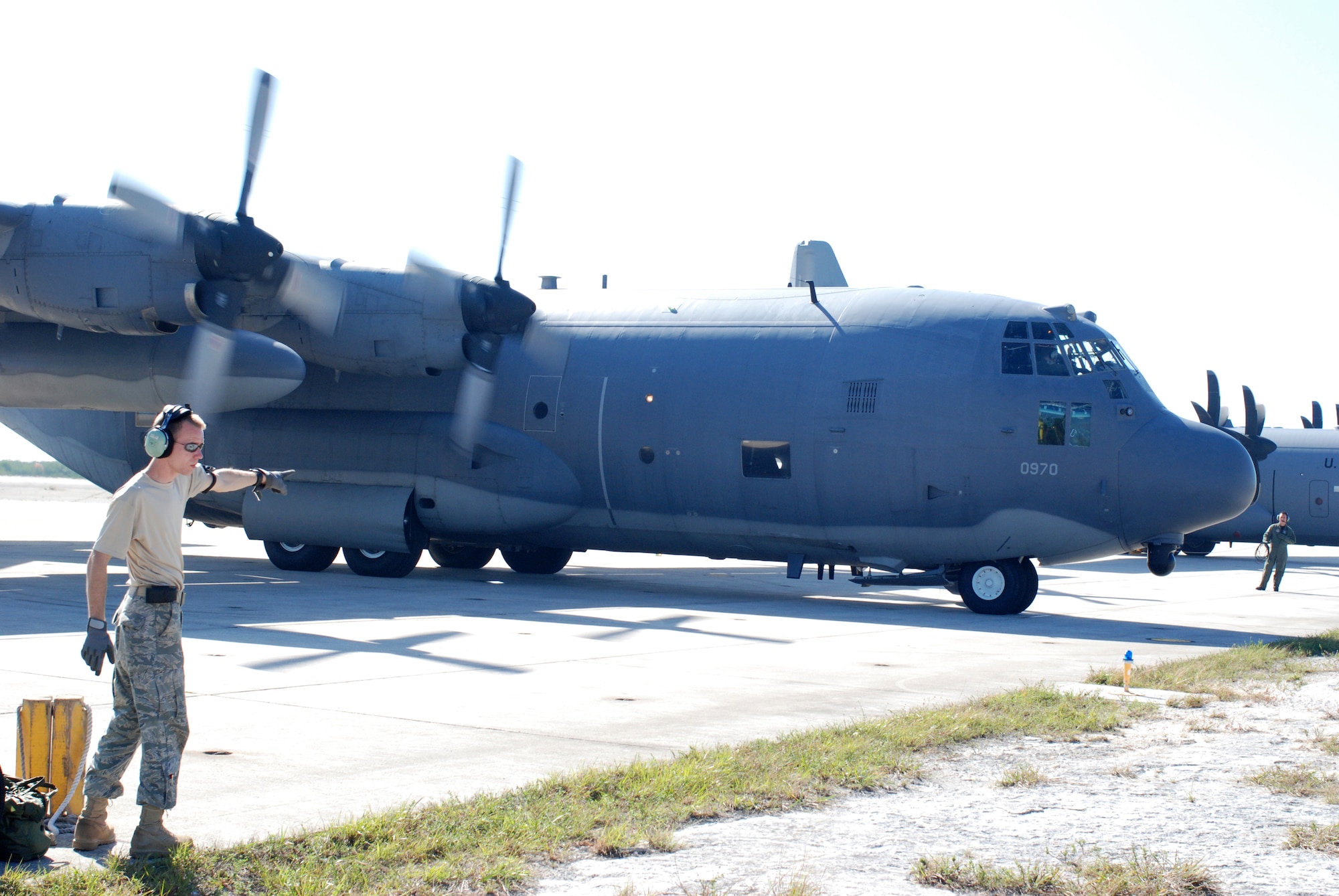 Key West, Fla. - The flight crew does pre-checks of the HC-130/N, King, before the HALO jumps during the 2009 SAREX in Key West. The King was first flown in 1964 and is an essential part of the CSAR for the Air Force Reservists at the 920th Rescue Wing. Not only is the King responsible for the in-flight-refuel of the HH-60G Pave Hawk Helicopters, but is capable of flying over 4,000 miles to assist in search and rescue efforts. (U.S. Air Force Photo/Staff Sgt. Leslie Kraushaar)
