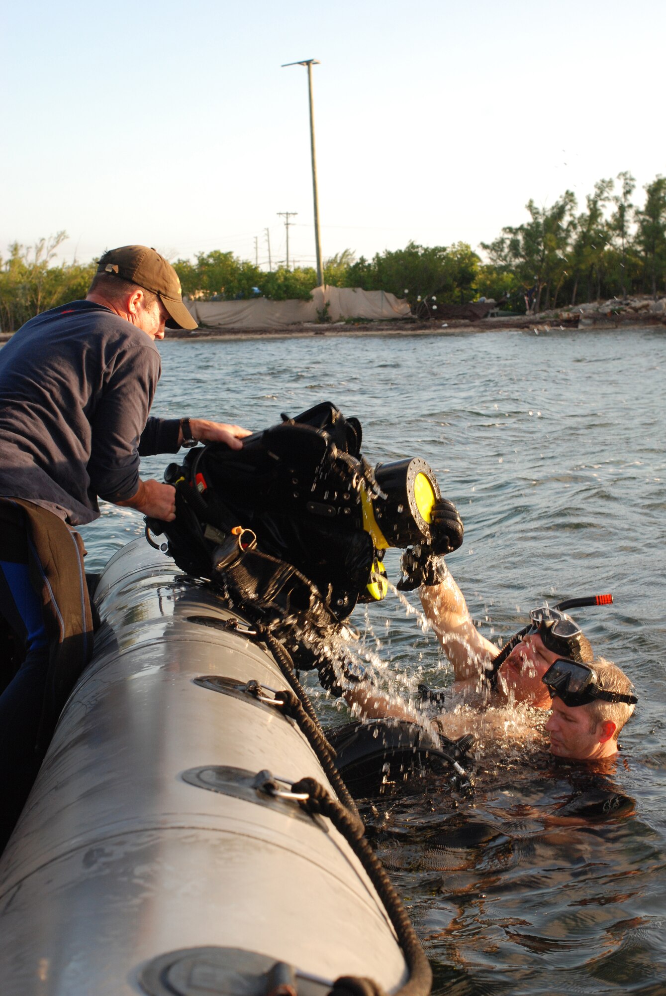 Key West, Fla. - Canadian SARTechs and the Pararescuemen from the 920th Rescue Wing took advantage of the clear ocean waters to get some practice dives in. PJs are trained as combat rescue divers and dive to depths of 130 feet for recovery operations. (U.S. Air Force photo/Staff Sgt. Leslie Kraushaar)