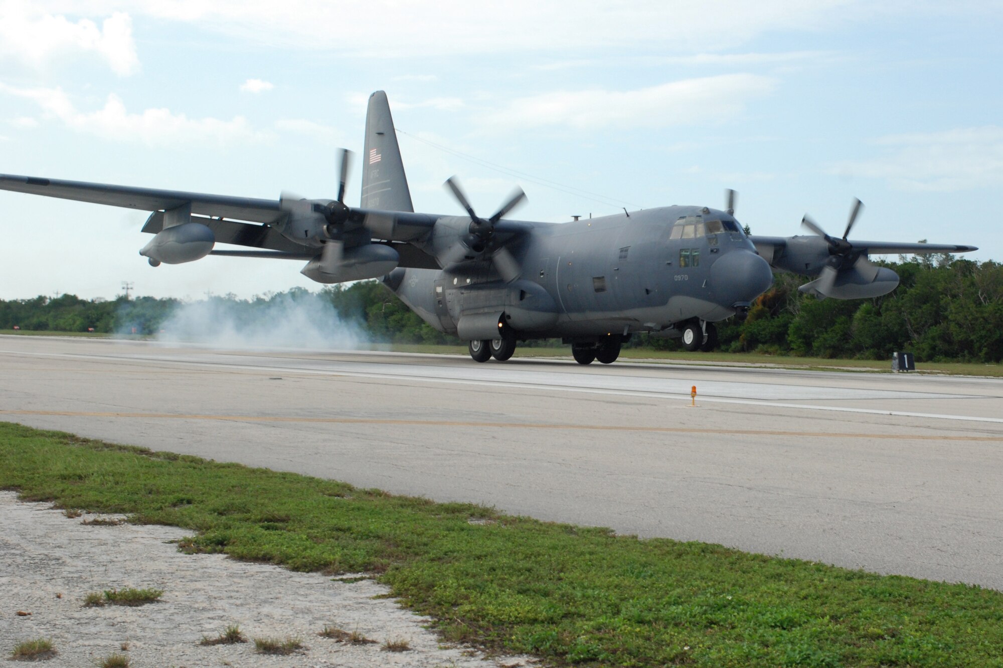 Key West, Fla. - An Air Force Reserve HC-130/N, or King, completes an accuracy landing during the 2009 Key West SAREX. The King is able to do a quick-stop on a short runway. This type of landing is important for short fields or areas where there is  limited space for a HC-130 to land. (U.S. Air Force Photo/Staff Sgt. Leslie Kraushaar)