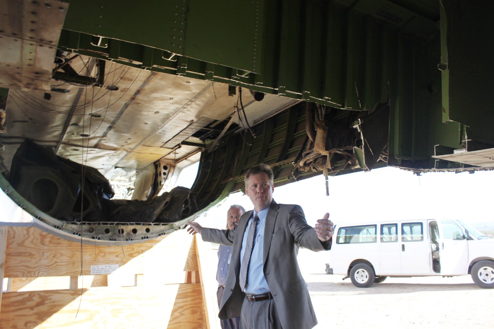 Patrick Dagle, the director of the 751st Electronic Systems Group at Hanscom Air Force Base, Mass., looks at a 707 aircraft that has been used for parts reclamation at the 309th Aerospace Maintenance and Regeneration Group at Davis-Monthan AFB, Ariz.  AMARG structural mechanics removed a keel beam from the aircraft to use in a special sensor integration program demonstration. (Courtesy photo)