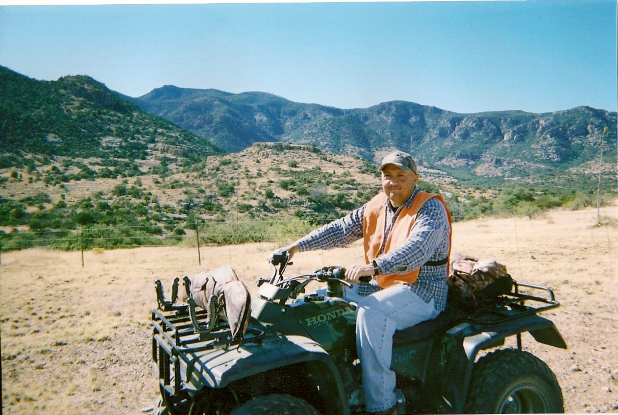 Chaplain (Maj.) Mike Martinez pictured here with an all terrain vehicle moments before he and the four-wheeler were involved with saving a fellow deer hunter’s life. (Courtesy Photo)