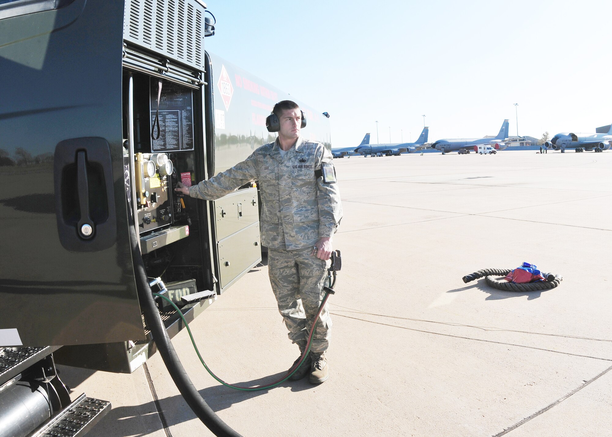 Staff Sgt. Tommy Lock, a 97th Logistics Readiness Squadron refueling specialist at Altus Air Force Base, Okla., refuels a Canadian CF-18 Hornet Dec. 4, 2009.  The Canadians are staging out of Altus AFB while conducting forward air control training at nearby Fort Sill.  (U.S. Air Force photo/Senior Airman Amanda Bower)