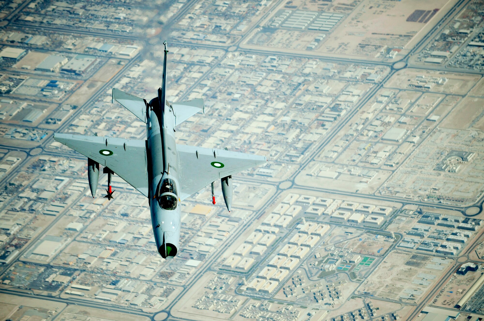A Pakistani F-7 conducts a training mission during a multinational exercise, Dec. 9, 2009, in Southwest Asia. Aircrews from France, Jordan, Pakistan, the U.K., and the U.S. trained together in the Air Forces Central area of responsibility in fighting a large-scale air war. (U.S. Air Force photo/Staff Sgt. Michael B. Keller) 