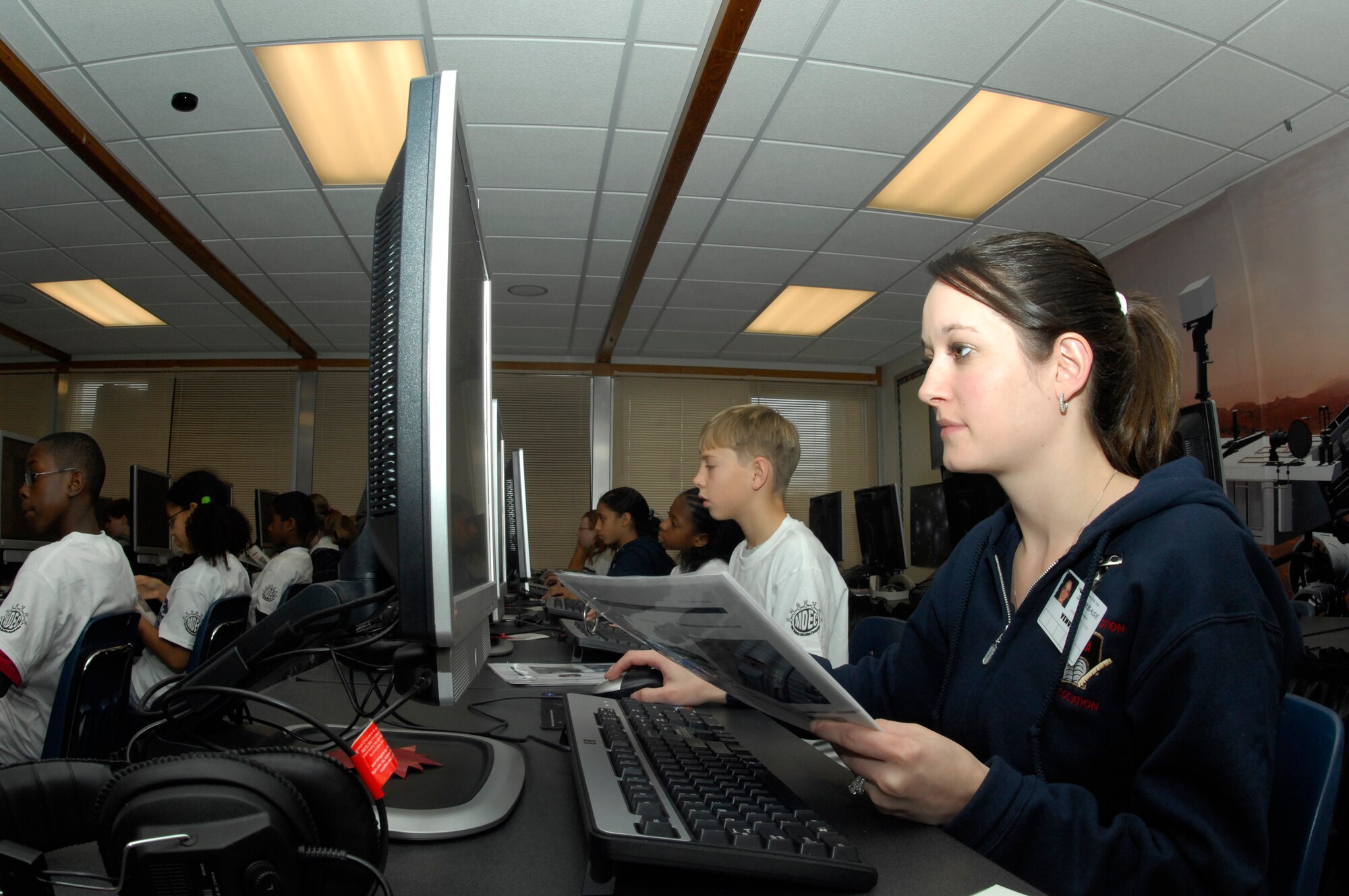 MINOT AIR FORCE BASE, N.D. -- Deanna Torres, a fifth grade teacher from Dakota Elementary School here, participates in Starbase along with her students here Dec. 18. Torres and her students learned how to build an Army Rover on Pro-Engineer, one of the many hands-on technological programs Starbase provides for elementary students. (U.S. photo by Airman 1st Class Ashley N. Avecilla)