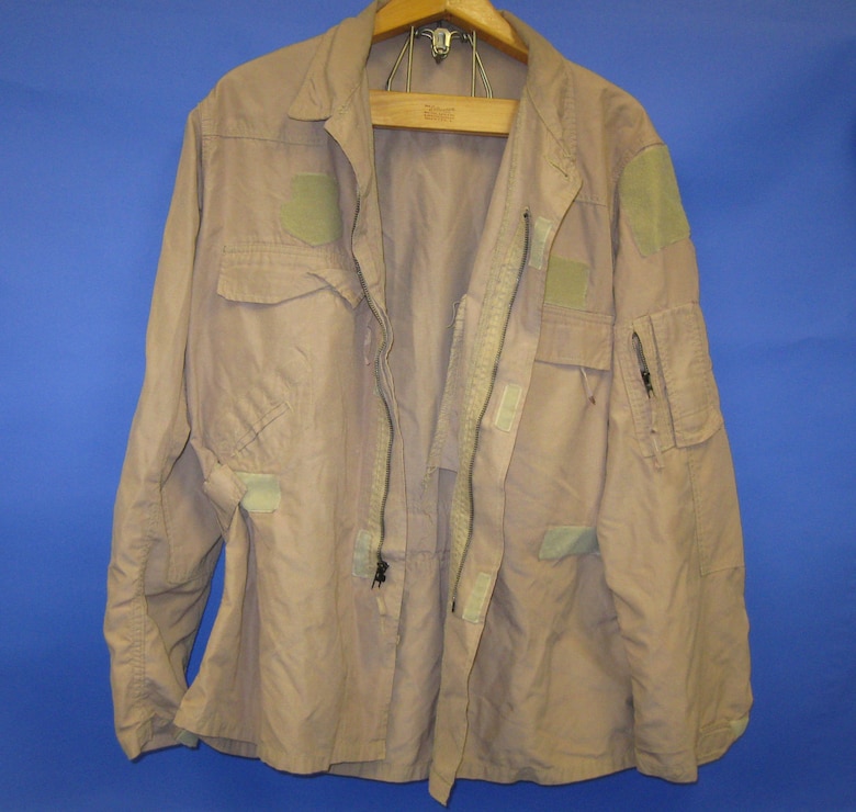 The U.S. Army distributed these two-piece flight suits to Special Operations Forces in Iraq and Afghanistan. Many aircrews preferred them because they did not bind while moving about the cabin. (U.S. Air Force photo)
