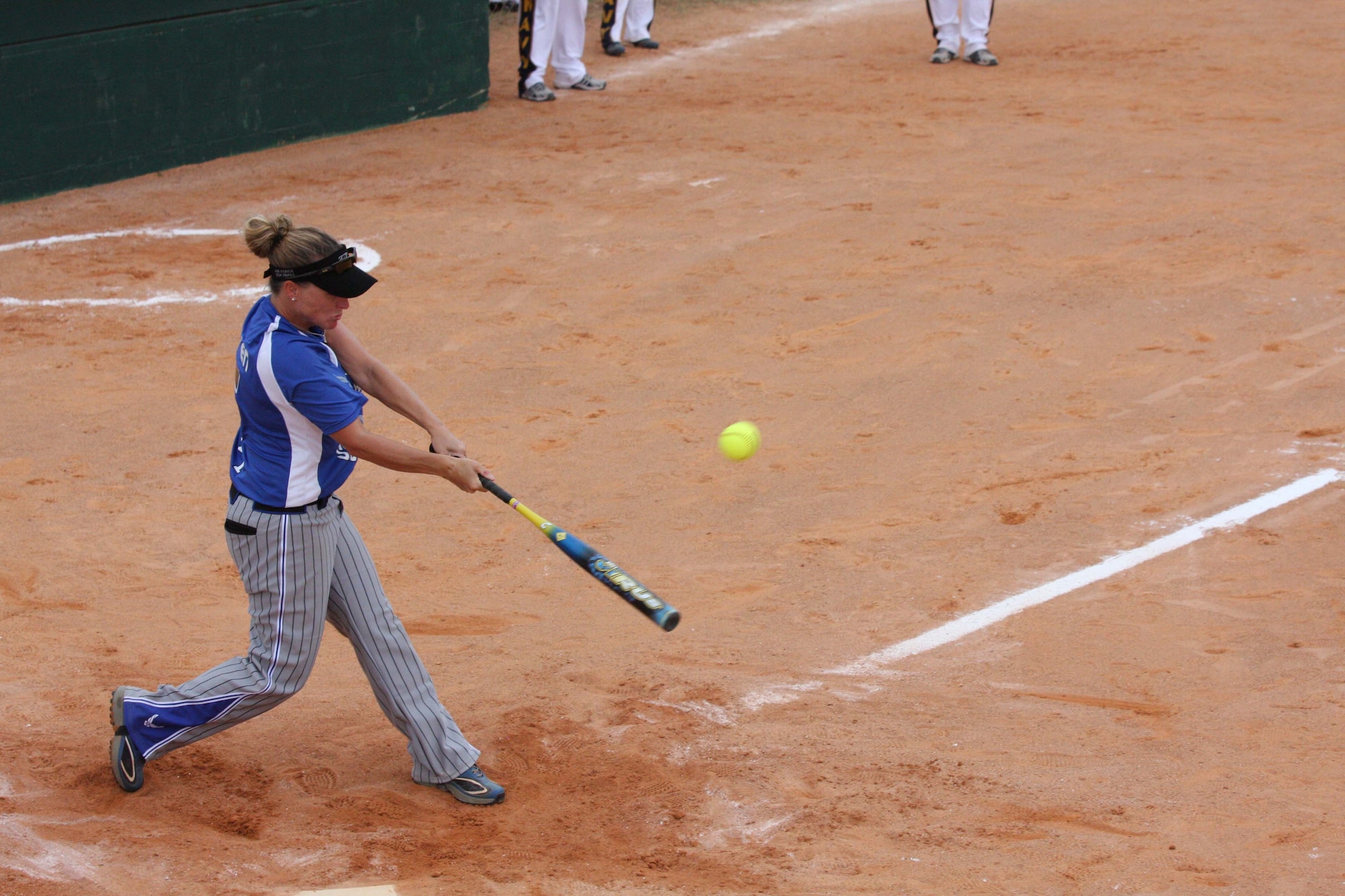 Master Sgt. Karrie Warren takes a mighty swing from the plate during the 2009 Armed Forces Tournament held at Naval Air Station Pensacola, Fla., Sept. 19-24. Sergeant Warren, assigned to the 601st Air & Space Operations Center at Tyndall AFB, Fla., was awarded the 2009 U.S. Air Force Female Athlete of the Year.  (U.S. Air Force photo by Steve Brown)