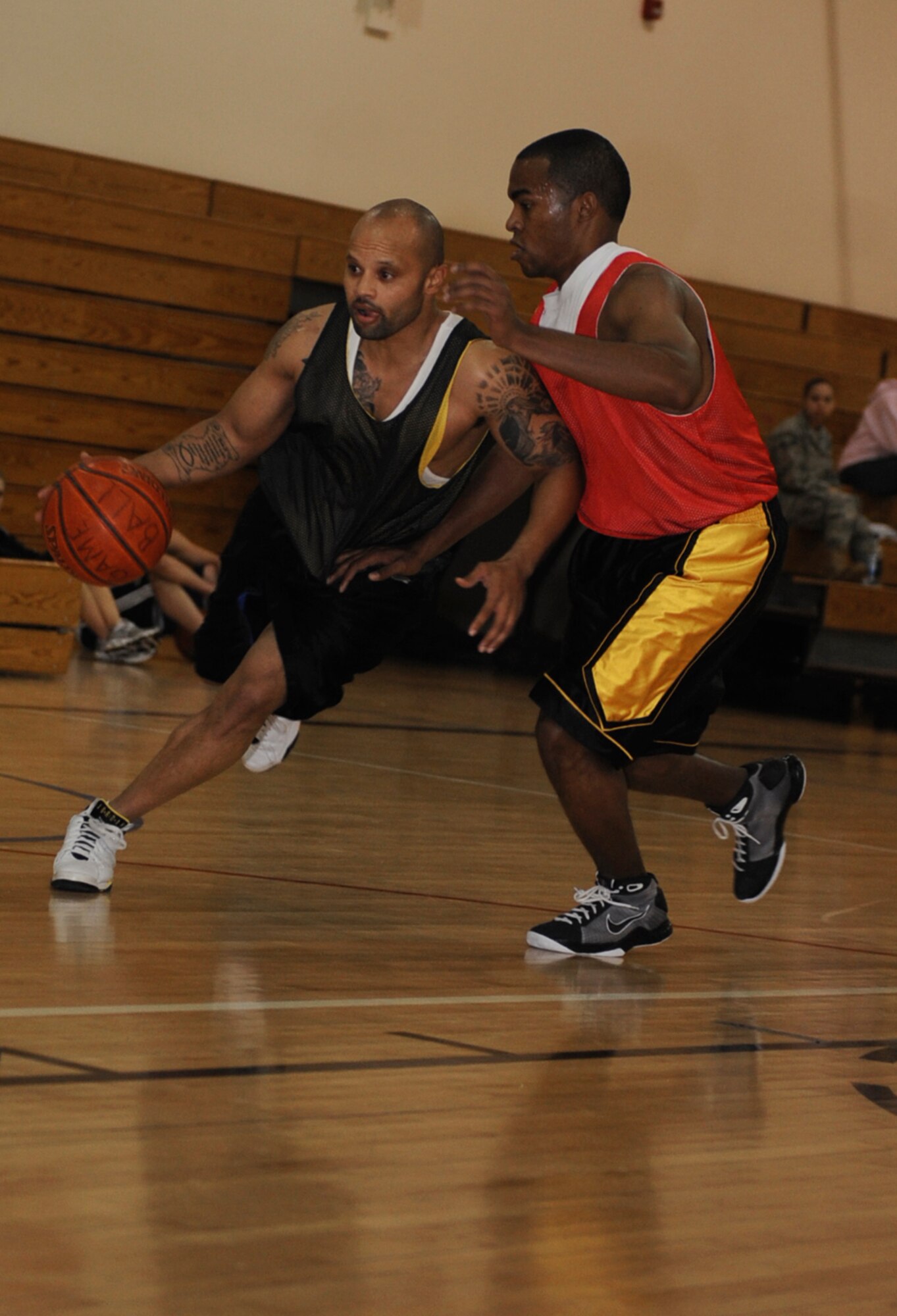 MOUNTAIN HOME AIR FORCE BASE, Idaho -- Thaddeus Guidry, 366th Security Forces Squadron point guard, drives past a defender from the 366th Component Maintenance Squadron during an intramural basketball game Dec. 15. CMS upset an undefeated SFS 46-45. (U.S. Air Force photo by Airman 1st Class Renishia Richardson)  