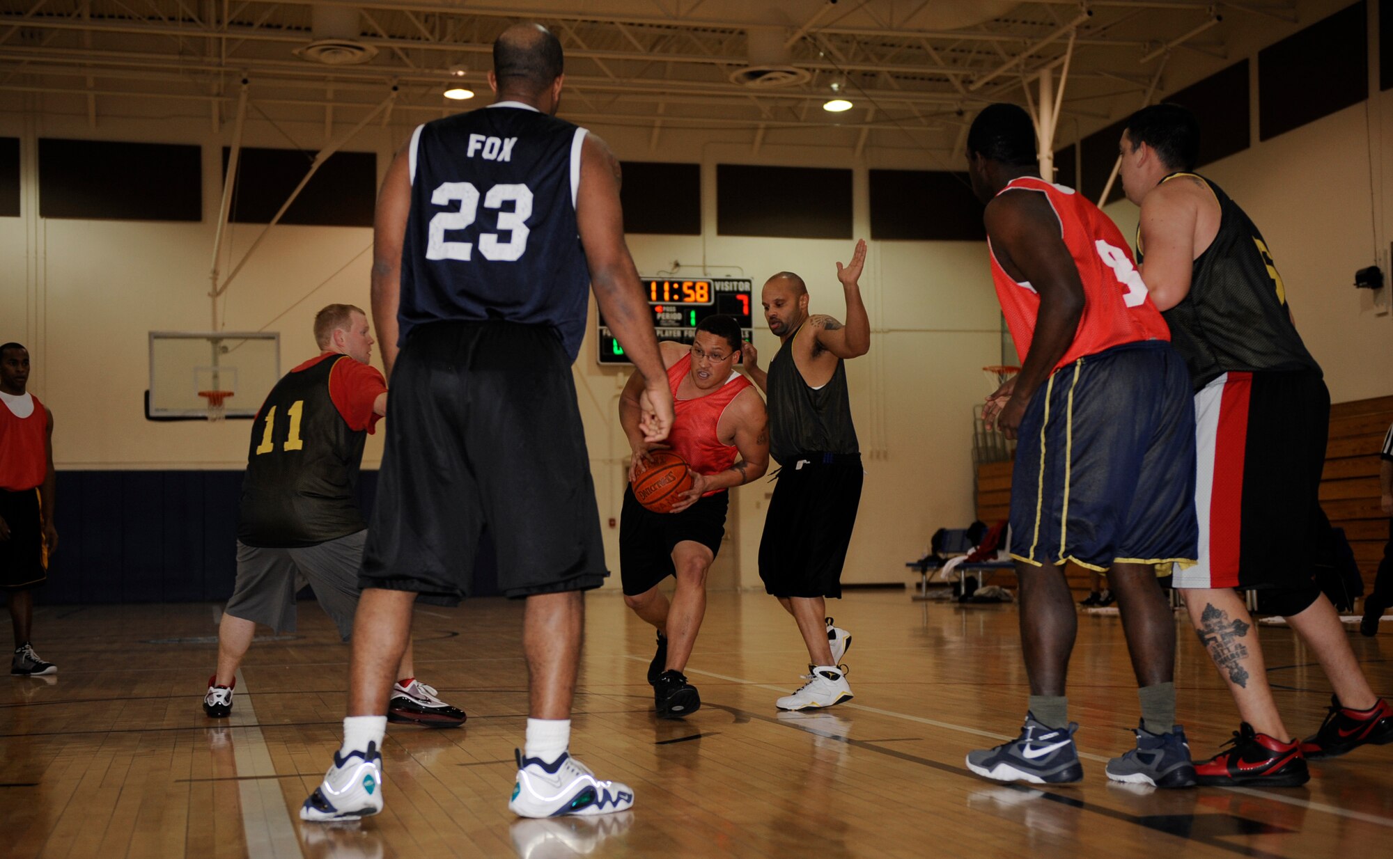 MOUNTAIN HOME AIR FORCE BASE, Idaho -- Samuel Everett, 366th Component Maintenance Squadron power forward, drives toward the basket during an intramural basketball game against the 366th Security Forces Squadron Dec. 15. CMS upset an undefeated SFS 46-45. (U.S. Air Force photo by Airman 1st Class Renishia Richardson)