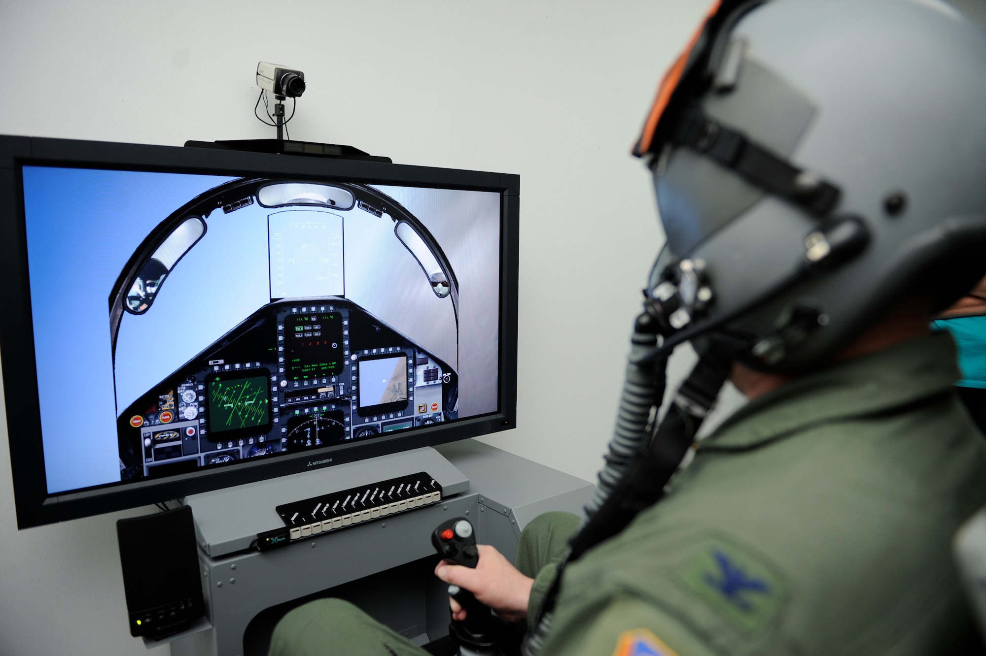 MOUNTAIN HOME AIR FORCE BASE, Idaho -- Col. James McGovern, 366th Operations Group commander, test the first on base sim-based hypoxia demo for fighter aircrew Dec. 16. The simulators help familiarize aircrew with the physiological and psychological stresses of flight. Without the aid of an oxygen mask aircrew experience symptoms of hypoxia, an oxygen deficiency of the tissue and blood cells that causes impairment of function at high altitudes. (U.S. Air Force photo by Airman 1st Class Renishia Richardson)