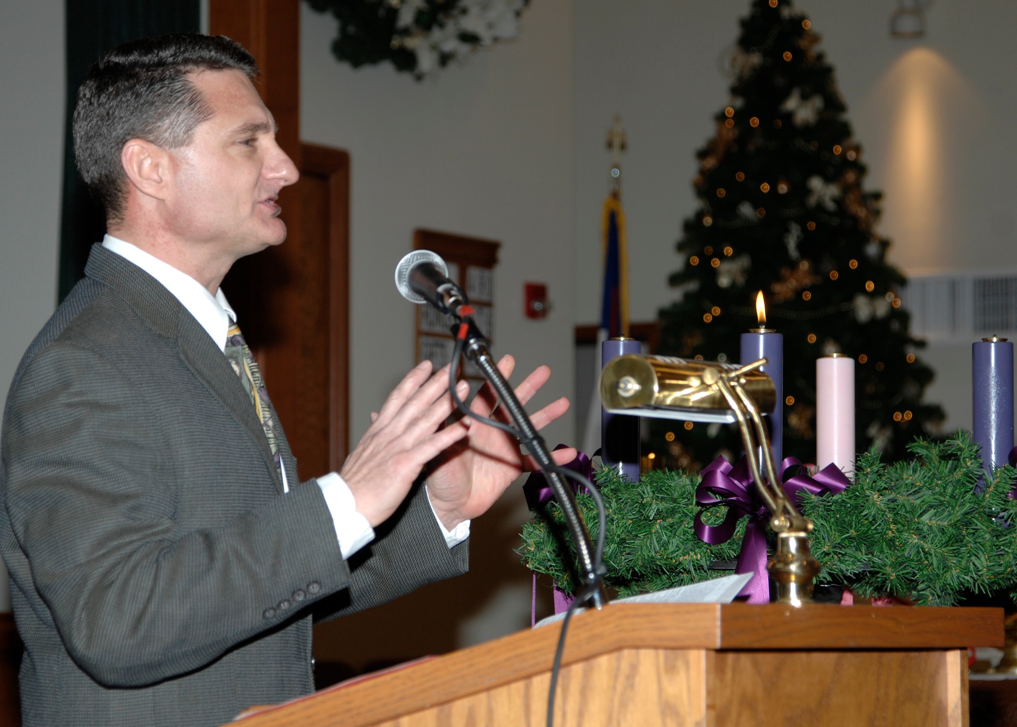 Chaplain (Capt.) Robert Borger, a 22nd Air Refueling Wing chaplain, delivers a sermon Dec 6, 2009, during a Sunday morning Protestant service at the McConnell Air Force Base, Kan., Chapel. During the service, Chaplain Borger spoke about living an abundant life and talked about how the actions of a few people can make a large difference in the lives of many. (U.S. Air Force Photo/Airman 1st Class Justin Shelton)