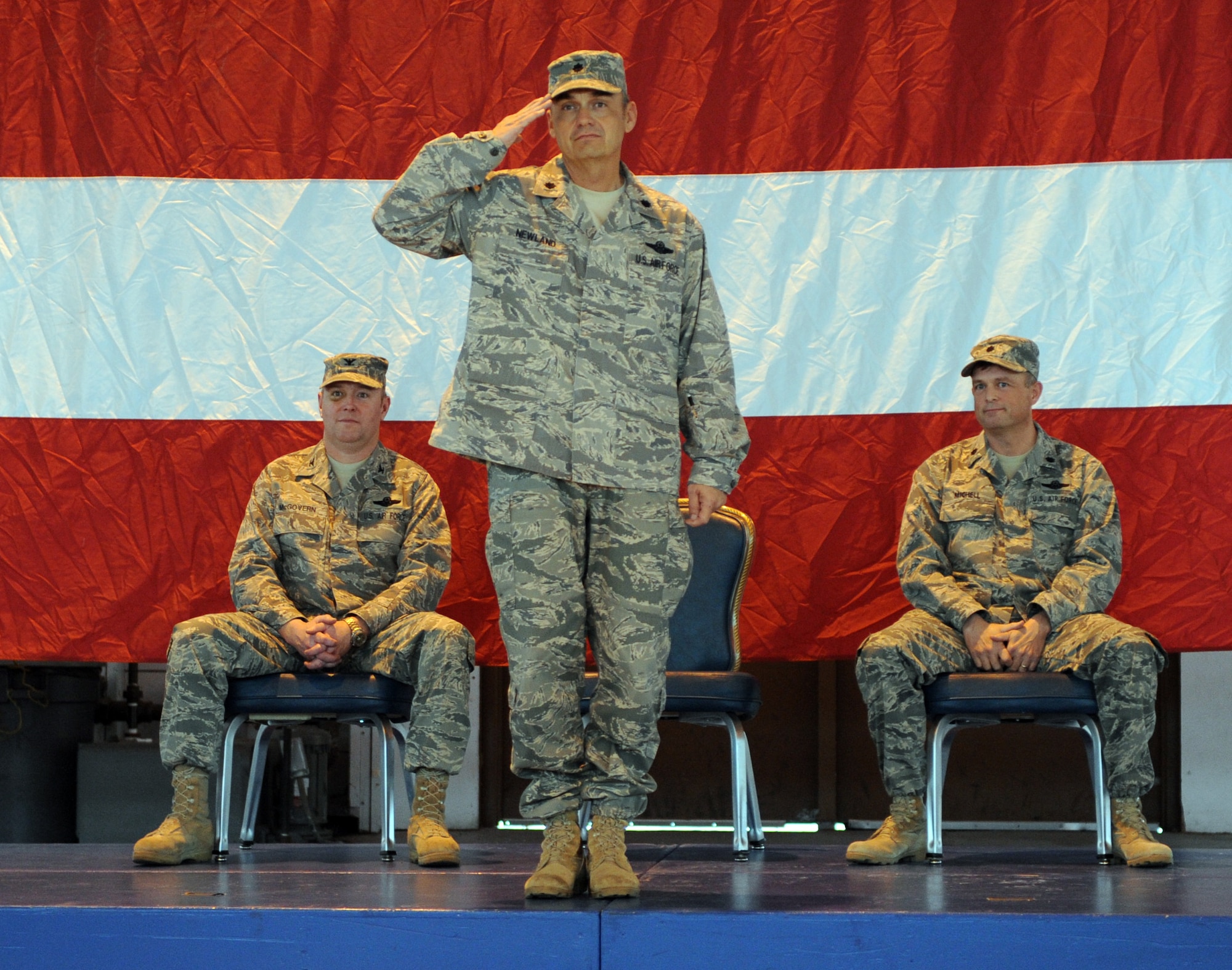 MOUNTAIN HOME AIR FORCE BASE, Idaho -- Lt. Col. Derek Newland, gives his final salute as commander of the 266th Range Squadron during a change-of-command ceremony Dec. 15 in hangar 201. Colonel Michell received command from Lt. Col. Derek Newland. (U.S. Air Force photo by Airman 1st Class Debbie Lockhart)