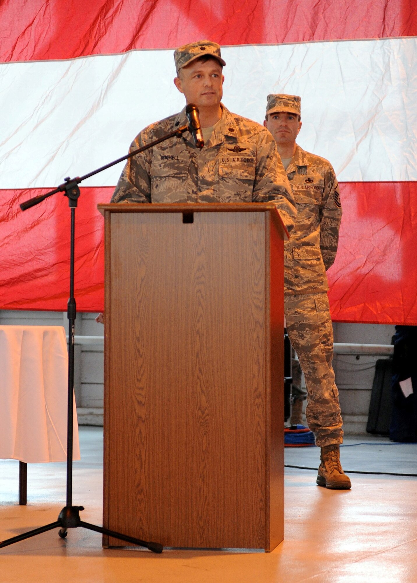 MOUNTAIN HOME AIR FORCE BASE, Idaho -- Lt. Col. William Michell, the incoming commander of the 266th Range Squadron, addresses the unit Dec. 15 in hangar 201. Colonel Michell received command from Lt. Col. Derek Newland. (U.S. Air Force photo by Airman 1st Class Debbie Lockhart)