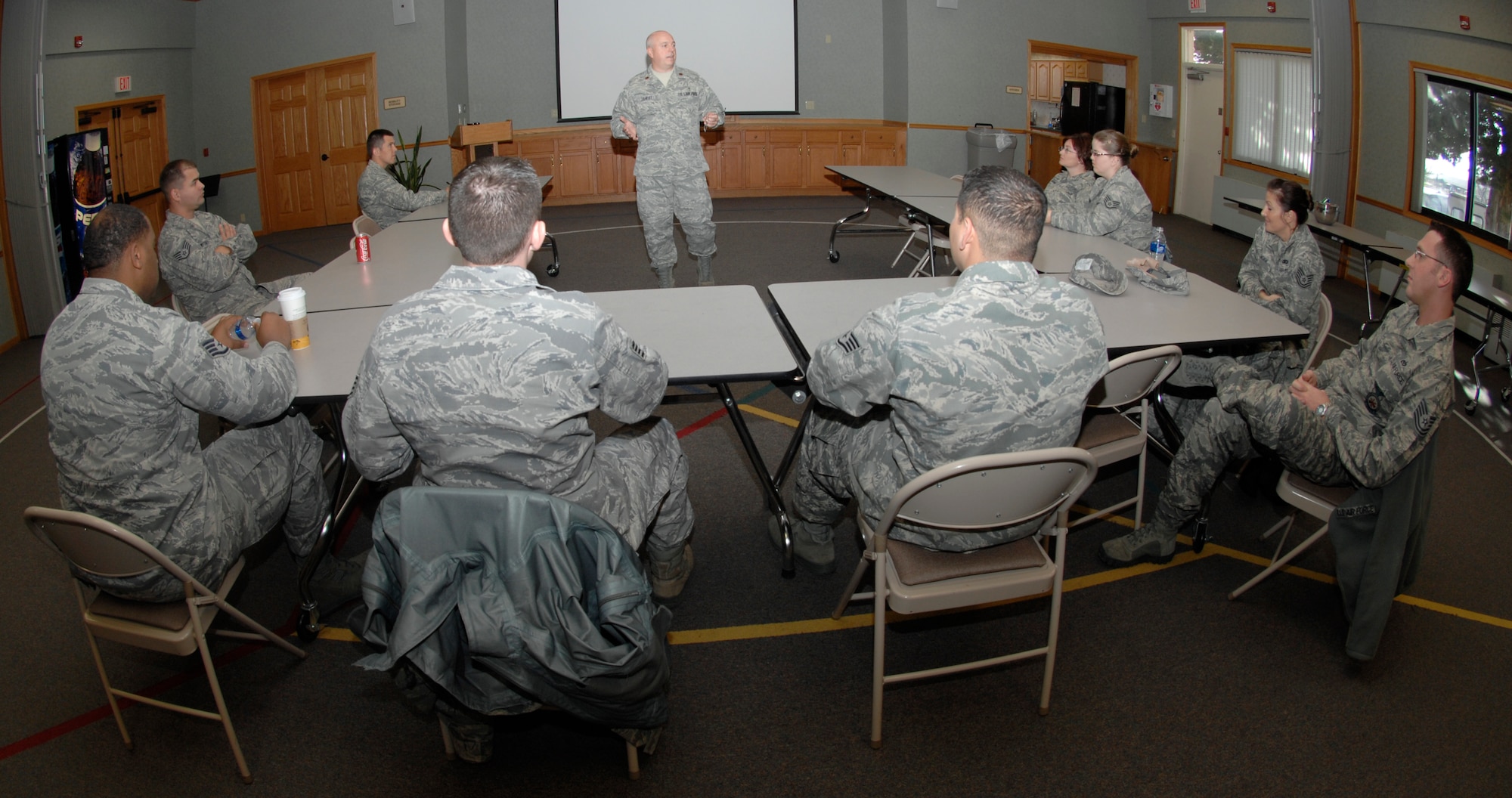 Chaplain (Maj.) Boyd Short, a 22nd Air Refueling Wing chaplain, talks to soon-to-be, non-commissioned officers and NCO academy graduates about suicide awareness and prevention during a safeTALK briefing, Dec. 2, 2009, at McConnell Air Force Base, Kan. Chaplains here use the safeTALK suicide prevention program to help Airmen identify and connect with people who might be having suicidal thoughts. They also teach Airmen how to help people contact community resources specializing in suicide intervention. (U.S. Air Force photo/Justin A. Shelton)