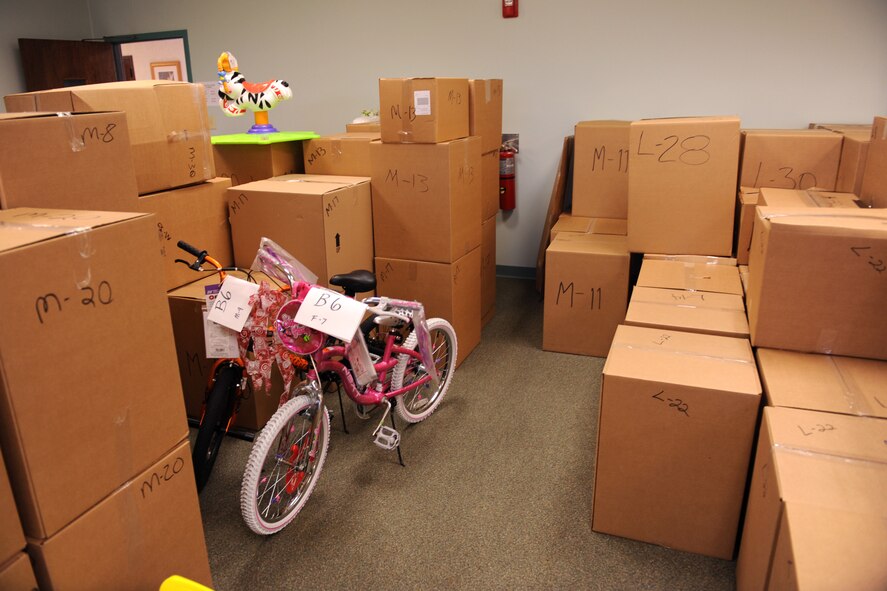 MOODY AIR FORCE BASE, Ga. -- Various donated gifts from the Adopt-a-Family program wait to be delivered here Dec. 16. These boxes will be transported to a warehouse in the community where families in need will come and pick them up before this holiday season. (U.S. Air Force photo by Airman 1st class Benjamin Wiseman)
