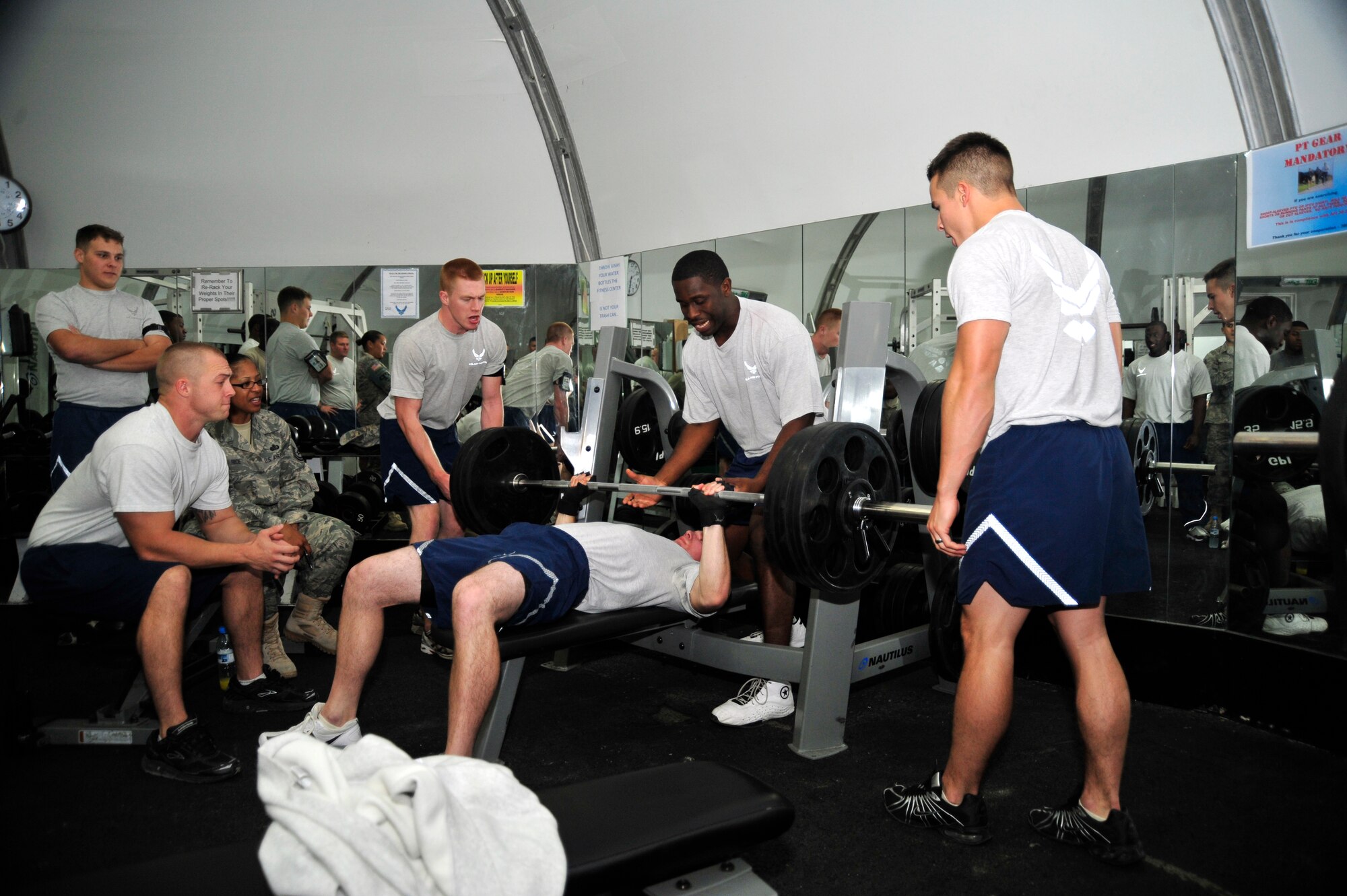 SOUTHWEST ASIA – Senior Airman Bobby Sebring, 380th Expeditionary Communications Squadron, attempts to bench presses 320 pounds at the “Strongest in the AOR” competition Dec. 18, 2009. Airman Sebring won 1st place in the bench press category. (U.S. Air Force photo/Tech. Sgt. Charles Larkin Sr)