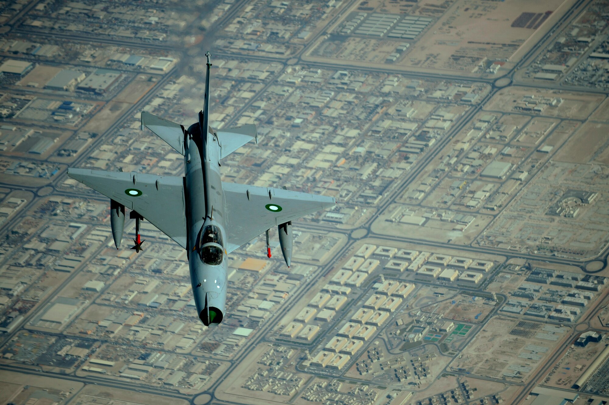 A Pakistani F-7 conducts a training mission during a multinational exercise, Dec. 9, 2009.  Aircrews from France, Jordan, Pakistan, the U.A.E., the U.K., and the U.S. trained together in the Air Forces Central area of responsibility in fighting a large-scale air war.  (U.S. Air Force photo by Staff Sgt. Michael B. Keller) (Released)


