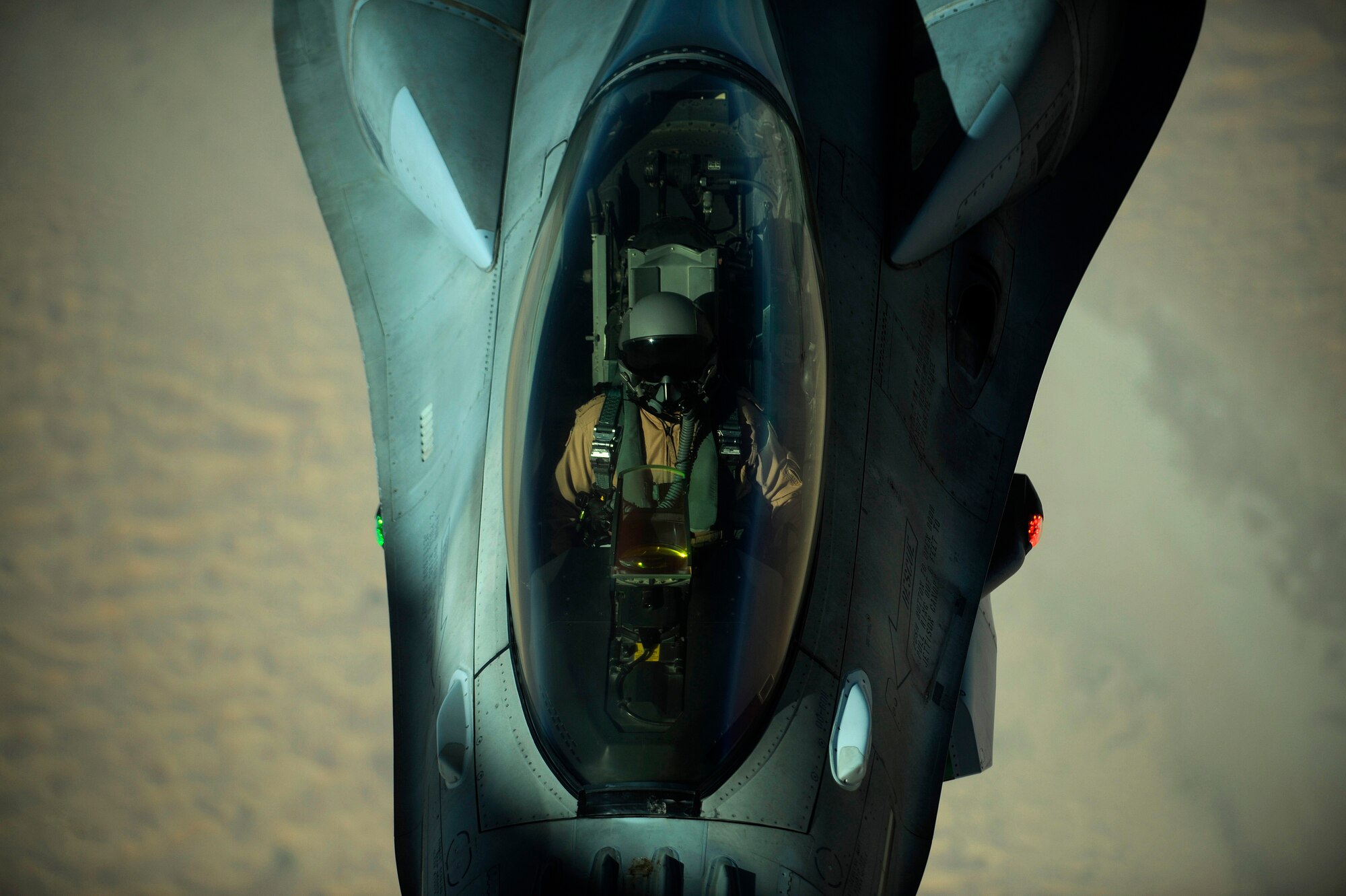 An Emirati F-16 is refueled by a 908th Expeditionary Air Refueling Squadron KC-10A Extender during a multinational exercise, Dec. 7, 2009.  Aircrews from France, Jordan, Pakistan, the U.A.E., the U.K., and the U.S. trained together in the Air Forces Central area of responsibility in fighting a large-scale air war.  (U.S. Air Force photo by Staff Sgt. Michael B. Keller) (Released)

