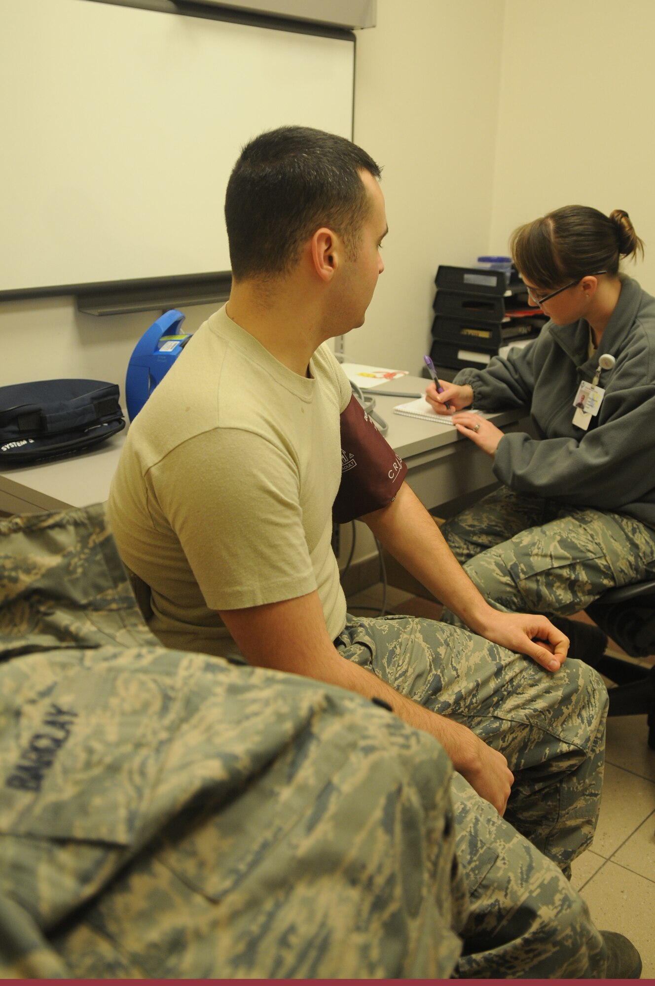 Staff Sgt. Angel Gutierrez, 31st Medical Group, NCO in charge of Surgical Services, takes vitals for Senior Airman Michael Barclay, 31st Maintenance Squadron crew chief, prior to his appointment. The 31st Medical Group has seen a rise in patients involved in snowboarding and skiing mishap over the last few weeks due to the amount of outdoor recreation activities available to the Aviano community. Senior Airman Barclay sustained a dislocated collar bone during a recent snowboarding mishap while on a trip to Austria.
(U.S. Air Force photo/ Senior Airman Nadine Y. Barclay)