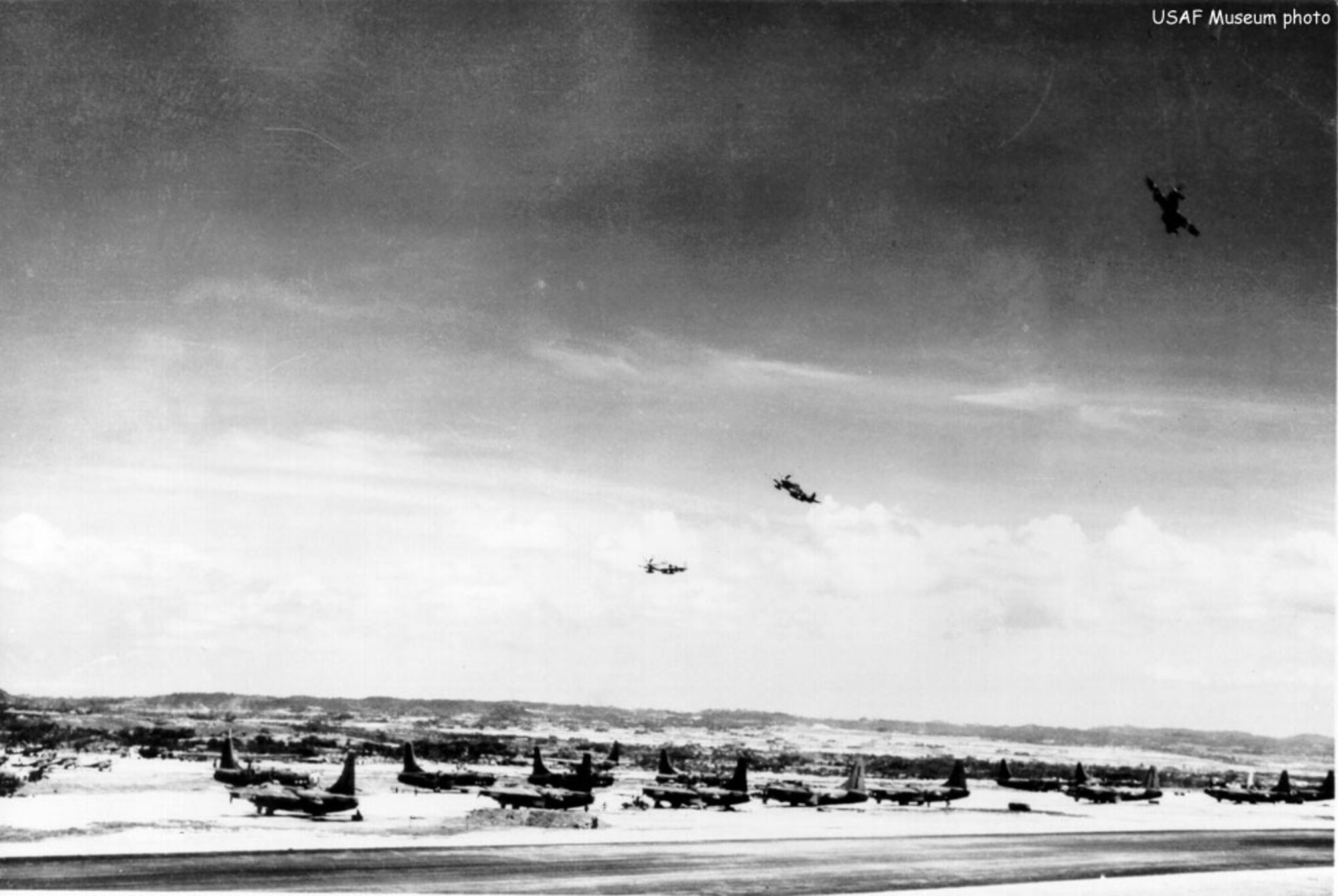 P-51s from the 35th Fighter Group fly over Yanton Field Okinawa, Japan.(Photo courtesy of the National Museum of the U.S. Air Force)