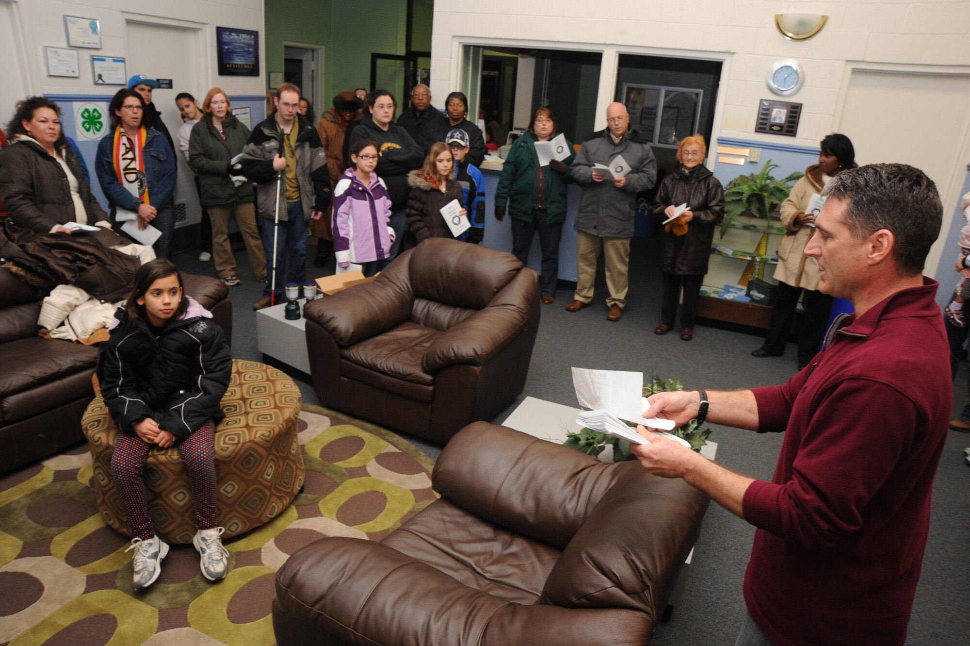 Chaplain (Capt.) Robert Borger, 22nd Air Refueling Wing, plans the caroling routes prior to a chapel sponsored  caroling event in Southwind base housing at McConnell Air Force Base, Kan., Dec. 20, 2009. (U.S. Air Force photo by Tech. Sgt. Chyrece Campbell)