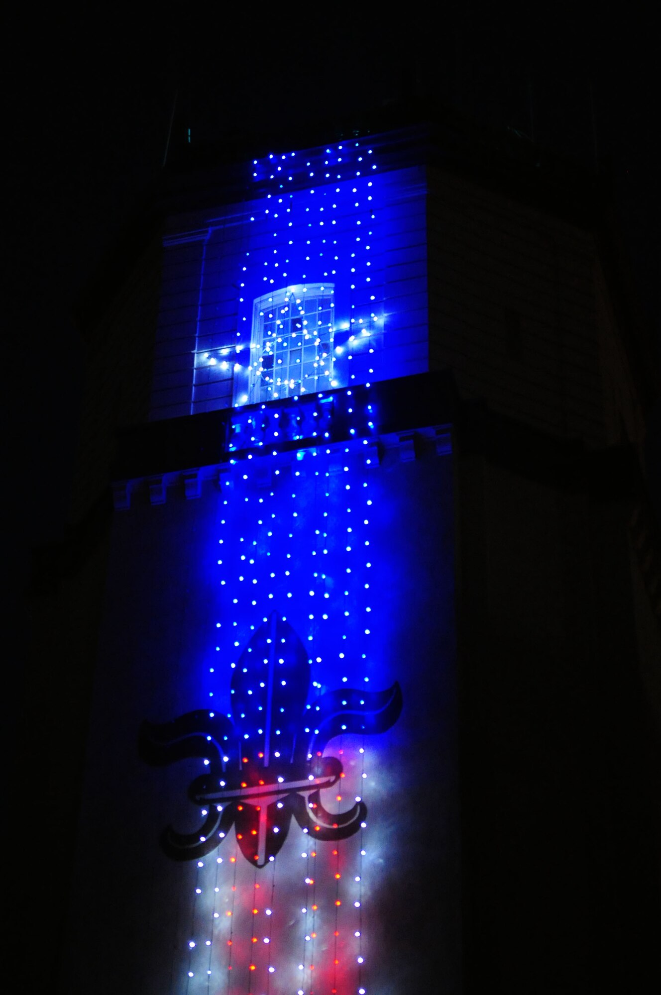 BARKSDALE AIR FORCE BASE, La. -- The lights of the 2d Bomb Wing headquarters welcome Airmen and visitors to the base, their warmth wishing Happy Holidays to all. (U.S. Air Force photo by Senior Airman Joanna M. Kresge)