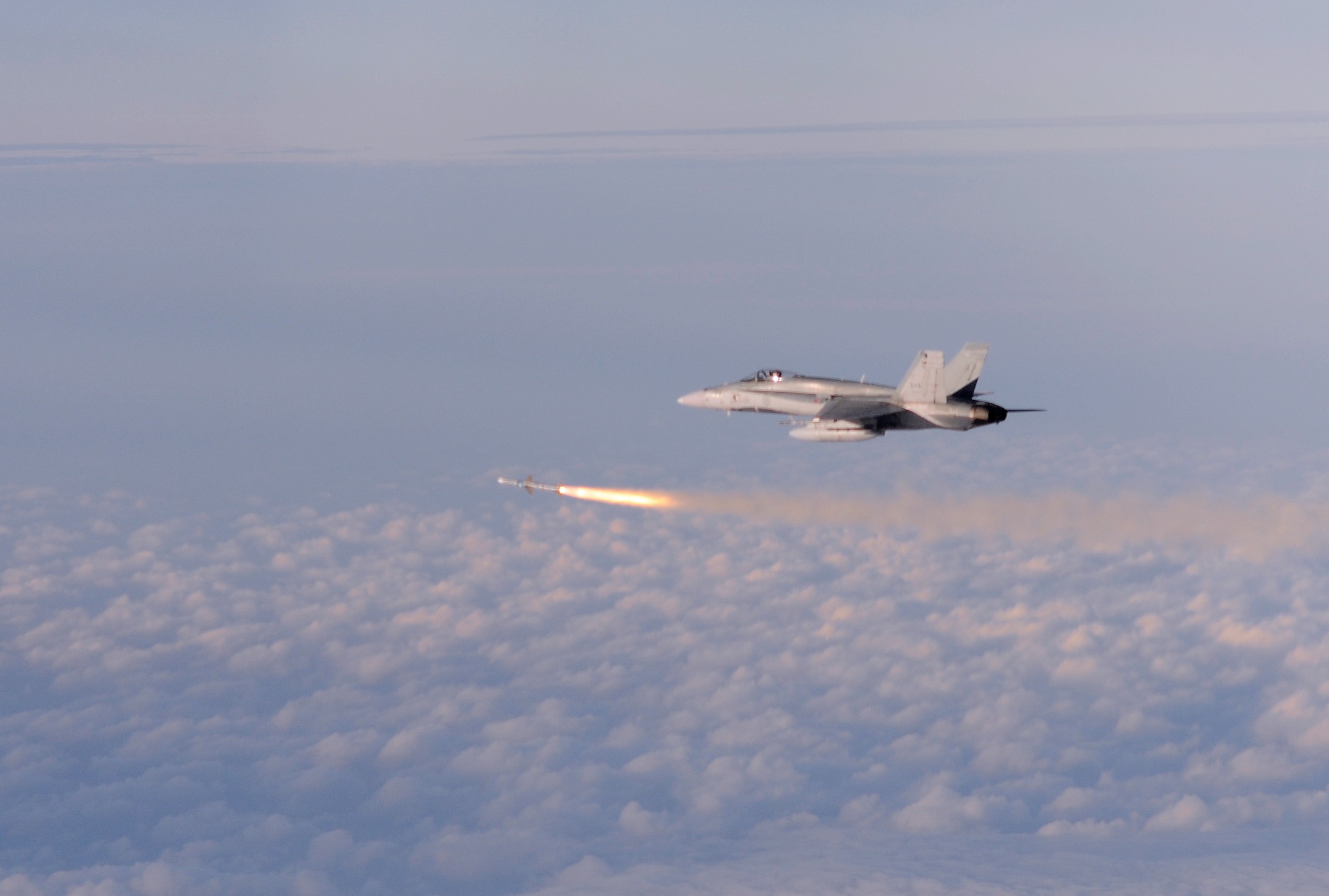 A pilot of the 409th Canadian Air Force fires an AIM 7 from an F-18 Hornet
during Weapon System Evaluation Program 10-03 on Dec. 4 at Tyndall Air Force Base, Fla. The WSEP program, run by the 53rd Weapons Evaluation Group, 83rd Fighter Weapons Squadron, is used to evaluate the effectiveness and suitability of combat air force weapon systems for aircrew and maintainers. The 53rd Wing headquarters is located on Eglin AFB, Fla.  (U.S. Air Force photo/ Tech.Sgt. Jason Wilkerson)


