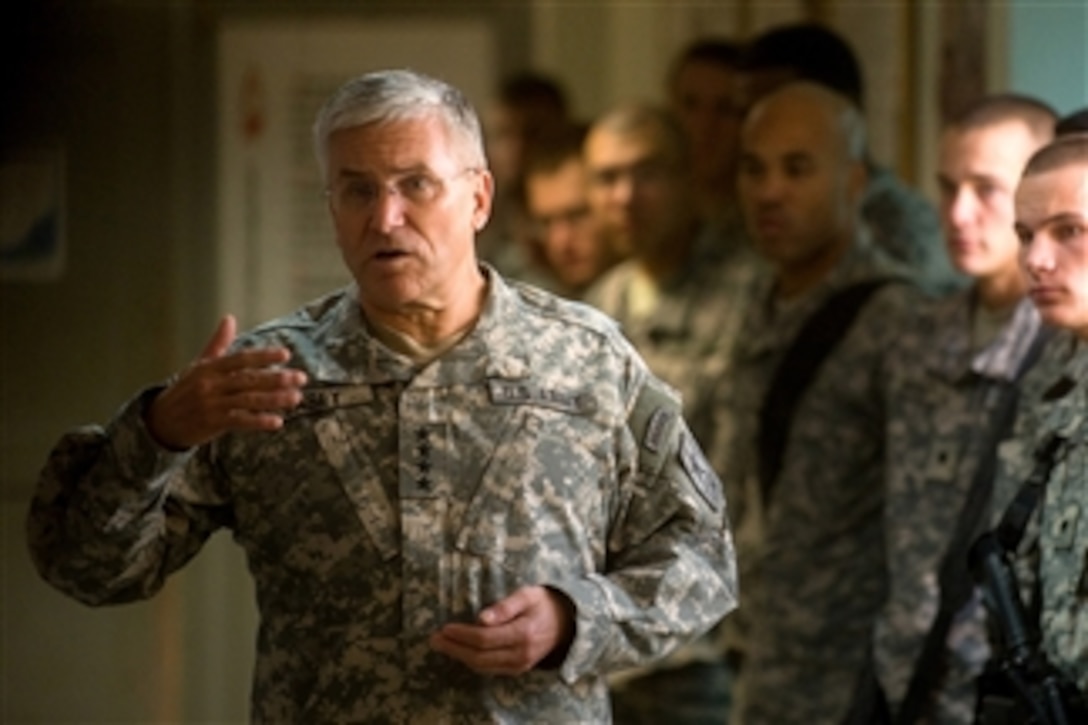 Chief of Staff of the Army Gen. George W. Casey Jr. answers questions from soldiers with the 194th Engineer Brigade at Balad, Iraq, on Dec. 20, 2009.  Casey is in Iraq to visit soldiers and thank them for their service.  