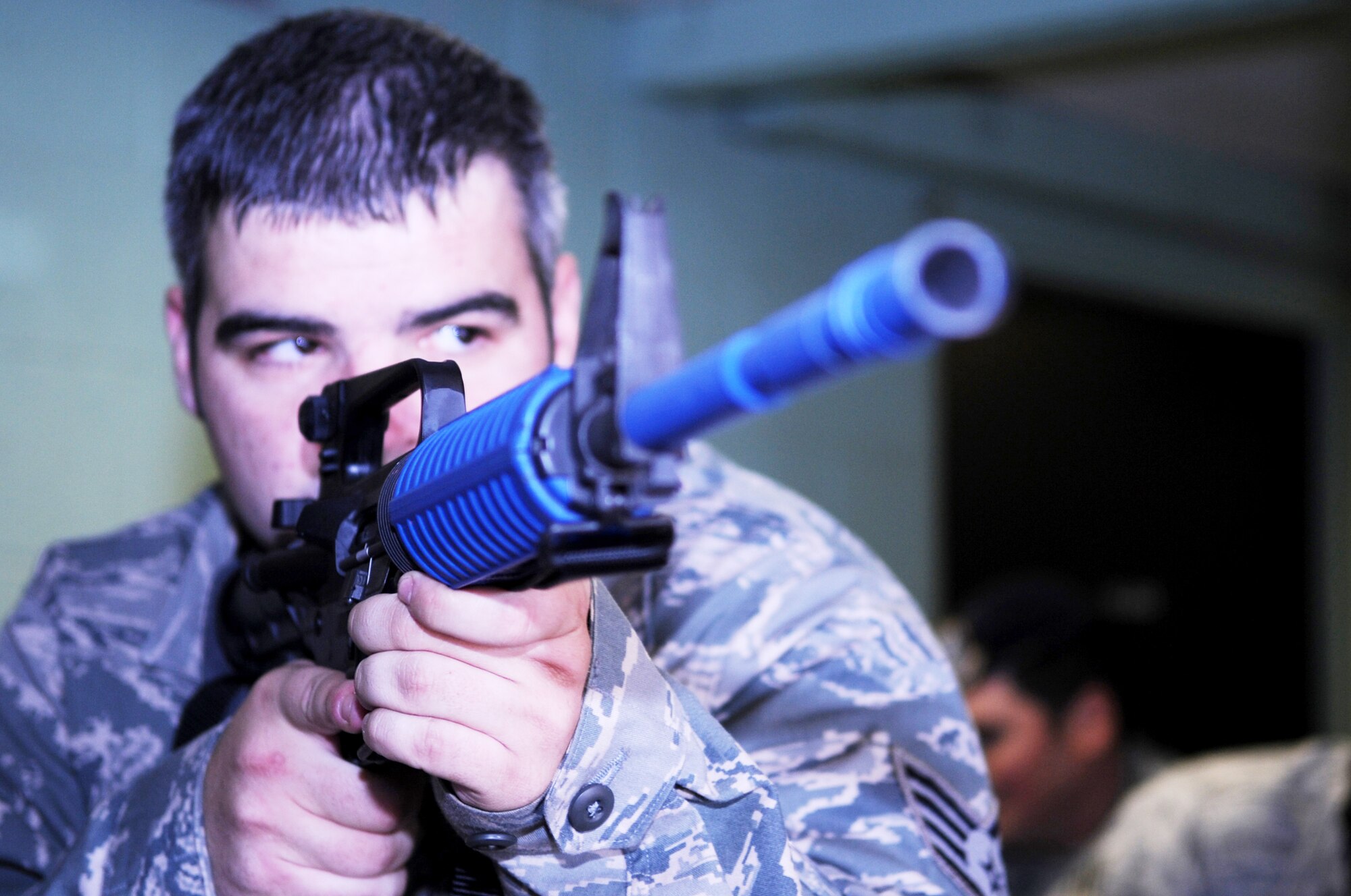 Staff Sgt. Matthew Bowker practices clearing a building during training Dec. 17, 2009, at Holloman Air Force Base, N.M. Sergeant Bowker is assigned to the 49th Security Forces Squadron. (U.S. Air Force photo/Airman 1st Class Sondra Escutia)