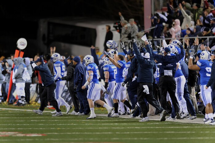 LAS VEGAS - The Brigham Young University Cougars sideline celebrates after scoring a touchdown in the second quarter of the MAACO Las Vegas Bowl at Sam Boyd Stadium Dec. 22. Over 200 hundred Airmen from Nellis and Creech Air Force Bases attended the game after unfurling the flag for the opening ceremonies.
(U.S. Air Force photo by Tech. Sgt. Michael R. Holzworth)