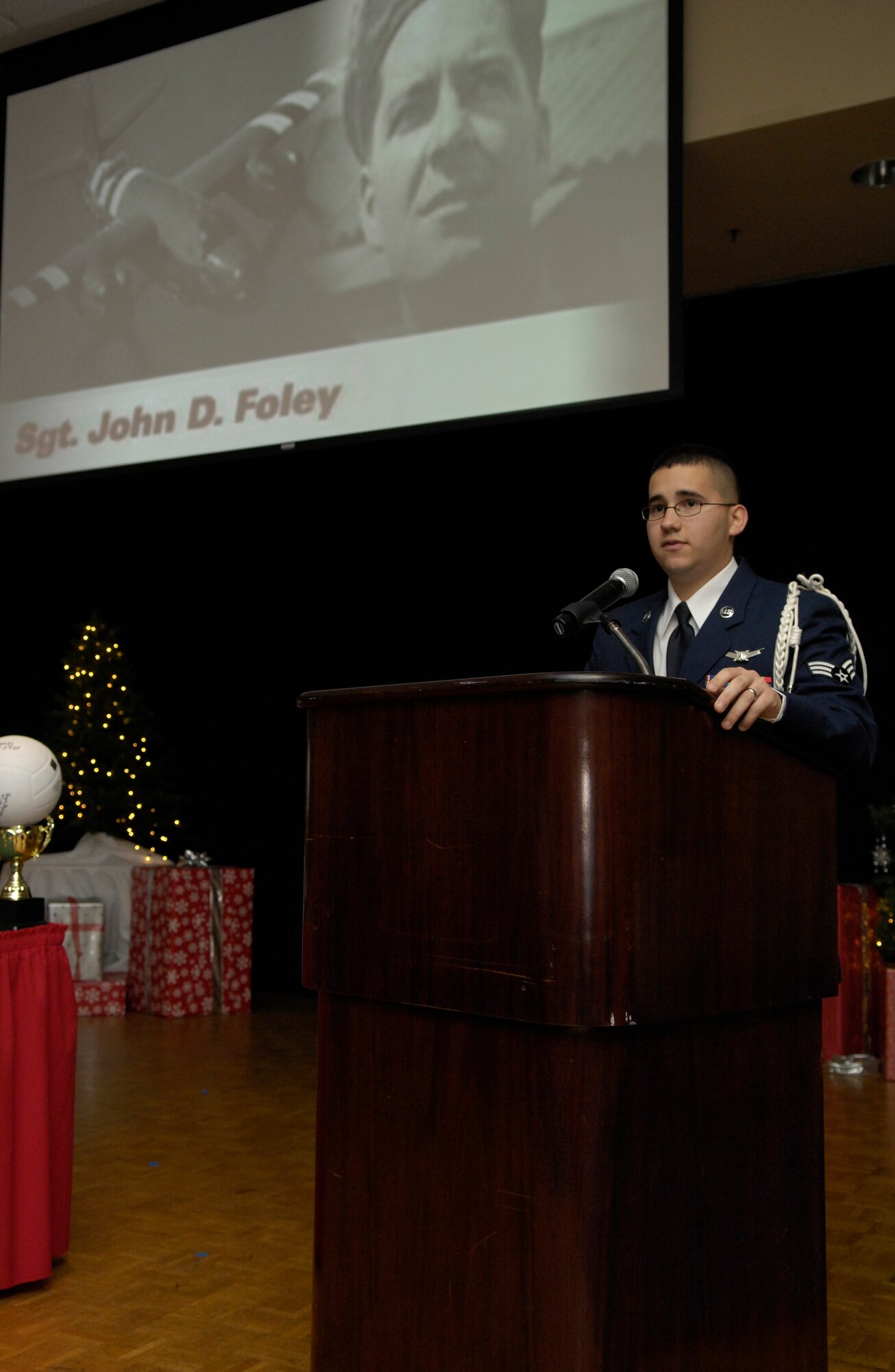 VANDENBERG AIR FORCE BASE, Calif. --  With everybody quietly listening, Senior Airman Anthony Harbo-Torres, an Airman Leadership School graduate from the 533rd Training Squadron, gives his enlisted heritage presentation to the audience of the ALS graduation here Tuesday, Dec. 22, 2009. Airman Harber-Torres received the John L. Levitow Award for his outstanding performance in his class. (U.S. Air Force photo/Airman 1st Class Andrew Lee) 