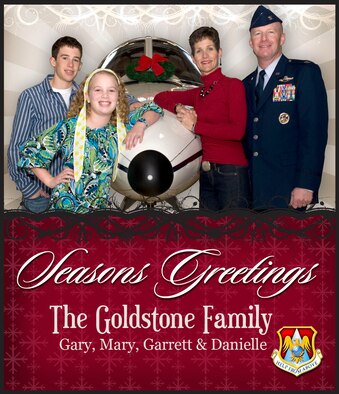 The Goldstone family wishes Team Scott Seasons Greetings for 2009.  Pictured are Col. Gary Goldstone, 375th Air Mobility Wing commander, his wife, Mary, and their children, Garrett and Danielle. (Photo illustration by 375 AMW/PA)