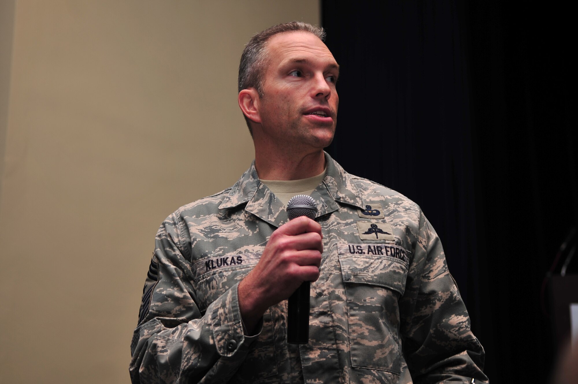 Chief Master Sgt. Martin Klukas, Air Combat Command command chief, speaks with Airmen during an enlisted call at the base theater on Seymour Johnson Air Force Base, N.C., Dec. 22, 2009. Chief Klukas said Gen. William Fraser, ACC commander, sent him to get the pulse of the Airmen and figure out what is needed to make their jobs run smoother. (U.S. Air Force photo/Airman 1st Class Rae Perry)