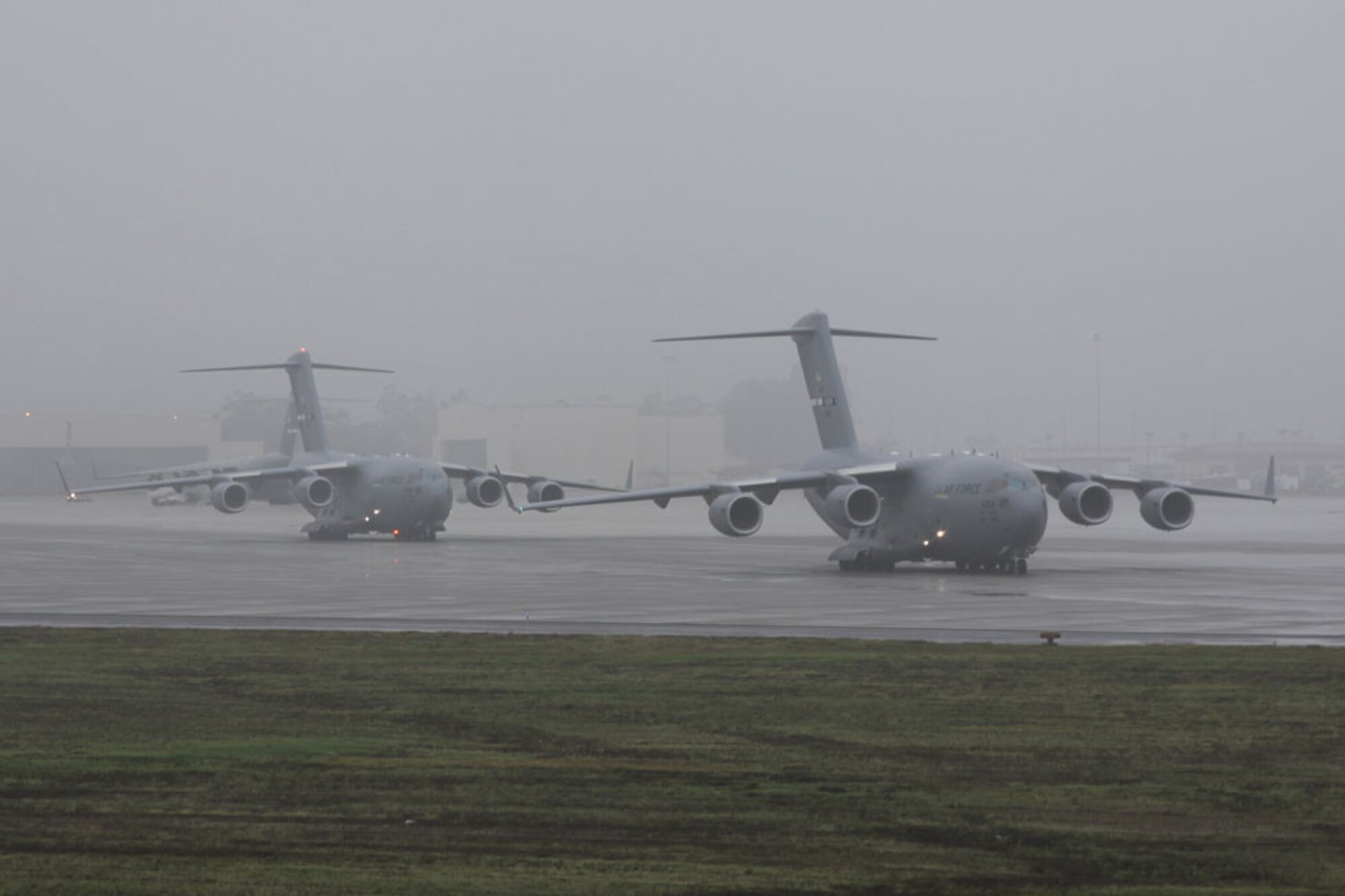 TRAVIS AIR FORCE BASE, Calif. -- Travis Team tankers and cargo aircraft conducted its first-ever "mass" aircraft launch, Dec. 21. The base launched KC-10s, C-17 Globemasters and C-5 Galaxy cargo aircraft in succession. Once airborne, the aircraft flew in formation then separate to fly normal low-level and air refueling routes. More than 330 training events were conducted during the flights. The 615th Contingency Response Wing at Travis controled the C-17 aircraft during landing exercises.  (U.S. Air Force photo/Tech. Sgt. Robert M. Rossman)