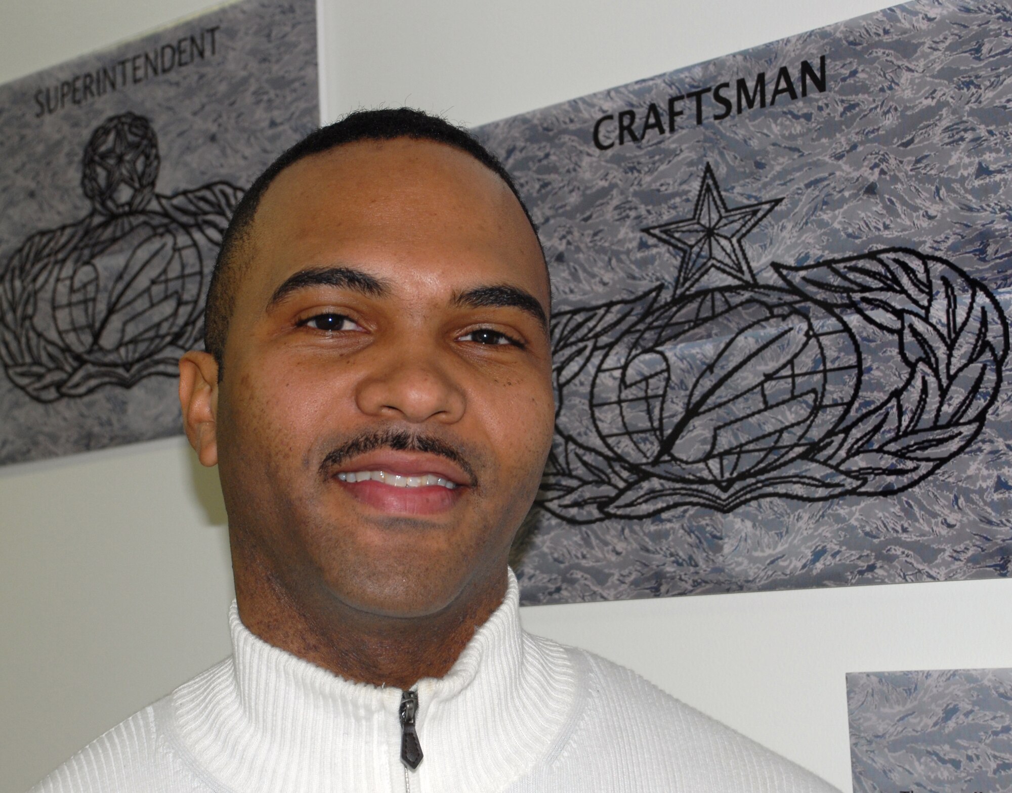 "(My New Year's Resolution is...) to spend more time with my family and kids, to be innovative in the work place, take a vacation and travel," said Master Sgt. Anthony Harris, 512th Mission Support Squadron. (U.S. Air Force photo/Airman 1st Class Shen-Chia Chu)