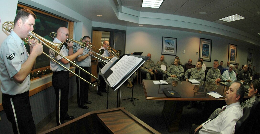 Trombone Carolers from the Air Force Band of Liberty Mach 4 group, perform for staff members of the 439th Airlift Wing at Westover Dec. 16. (US Air Force photo/Tech. Sgt. Andrew Biscoe)