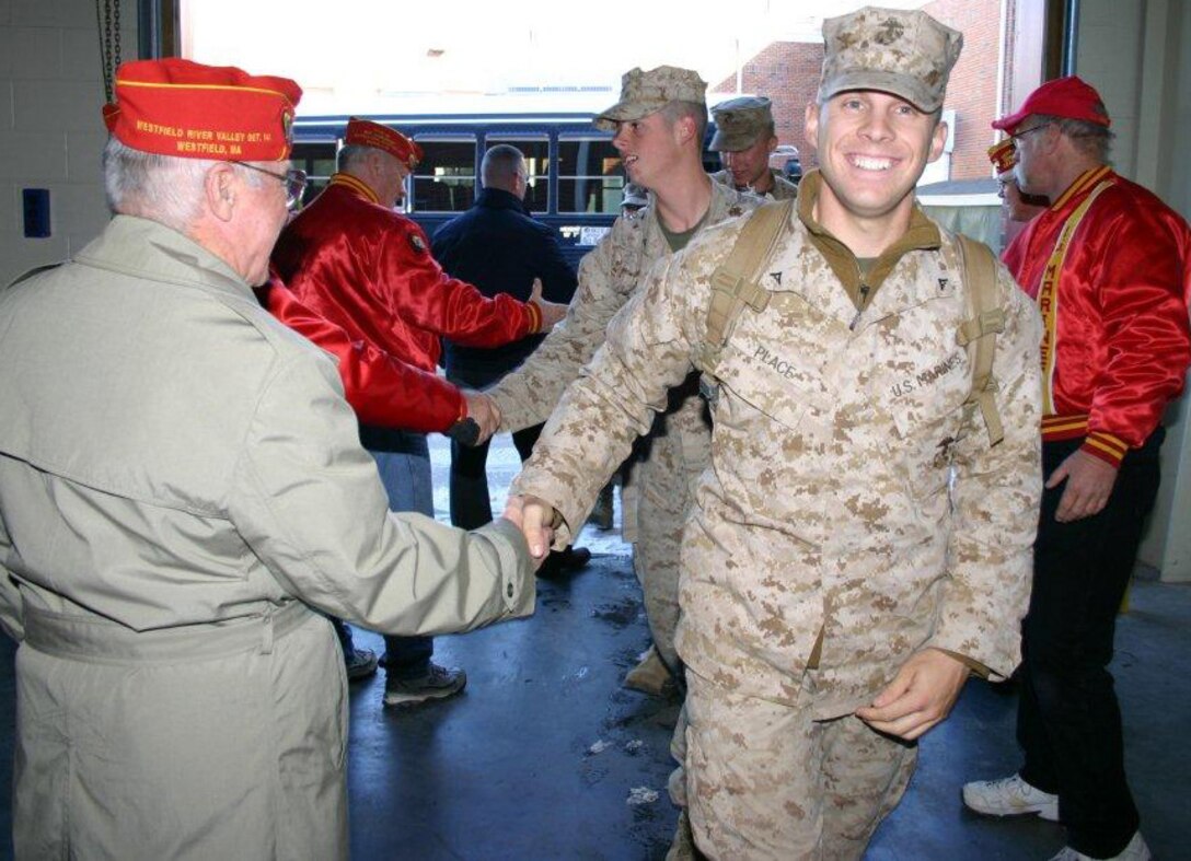 Marine reservists from Westover Air Reserve Base, Mass., are welcomed home Dec. 21 at the base. The Marines returned to their families following a deployment to Iraq. (Courtesy photo)