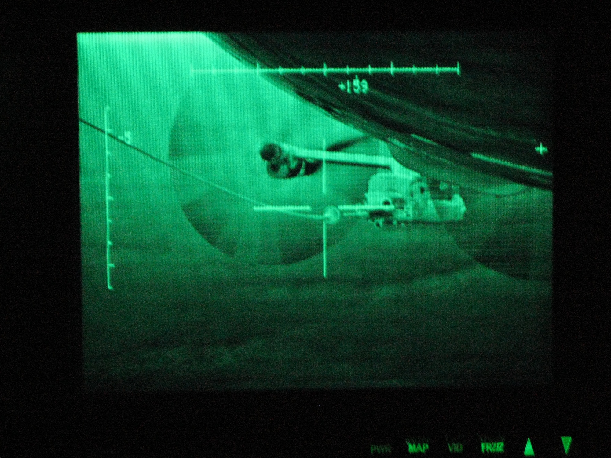 An RAF Mildenhall MC-130P Combat Shadow from the 352nd Special Operations Group performs night refueling on one of six CV-22 Osprey tiltrotor aircraft from Hurlburt Field, Fla., returning from their first combat tour. The 352nd SOG provided three Combat Shadows which passed more than 100,000 pounds of fuel to the CV-22s over a two-day period.  (U.S. Air Force photo/Capt. Juan Salazar) 
