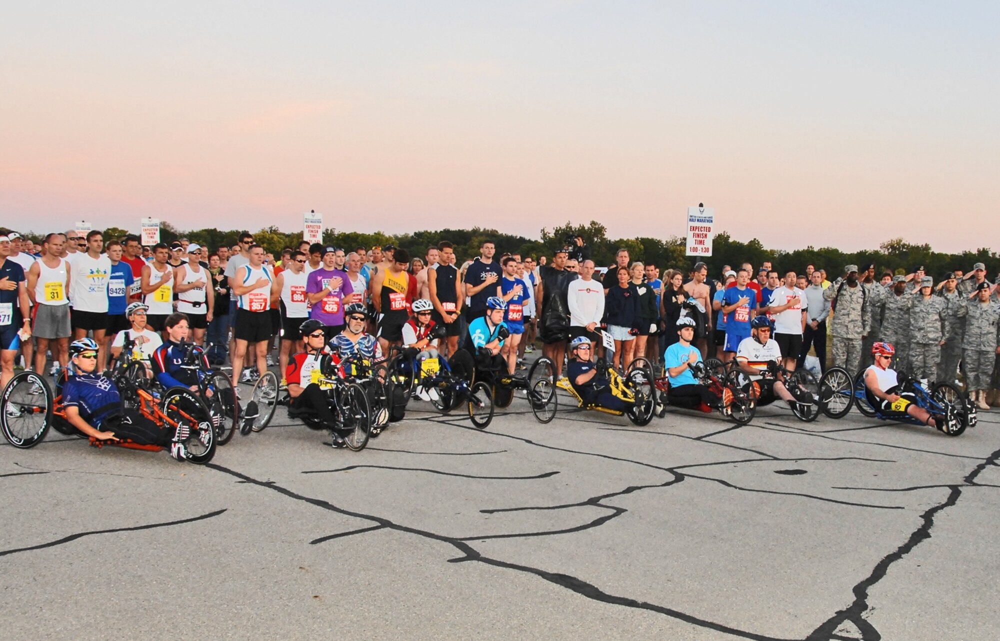 Runners and wheel racers participate in opening ceremonies for the 2009 United States Air Force Marathon at Wright-Patterson Air Force Base, Ohio in this file photo.  The 14th annual USAF Marathon is Sept. 18, 2010.  Registration for the 2010 marathon opens Jan. 1.  (U.S. Air Force photo/Ben Strasser) 