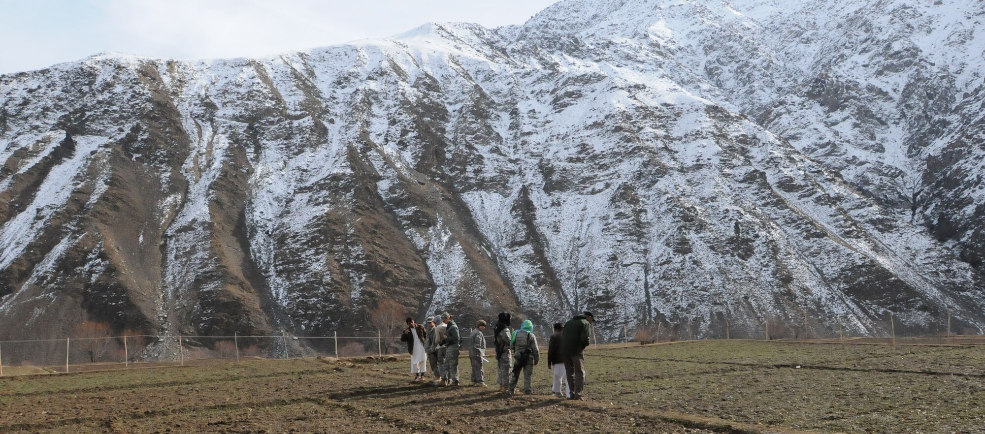 Several servicemembers from a Provincial Reconstruction Team at Bagram Airfield, Afghanistan, traveled to Forward Operating Base Lion in the Panjshir Valley to meet with Afghan women there.  During their visit they had the opportunity to view a field planted with saffron. The plant has been introduced to the Afghan women as a means to supplement their income and increase their livelihood. (U.S. Air Force photo/Senior Airman Susan Tracy)