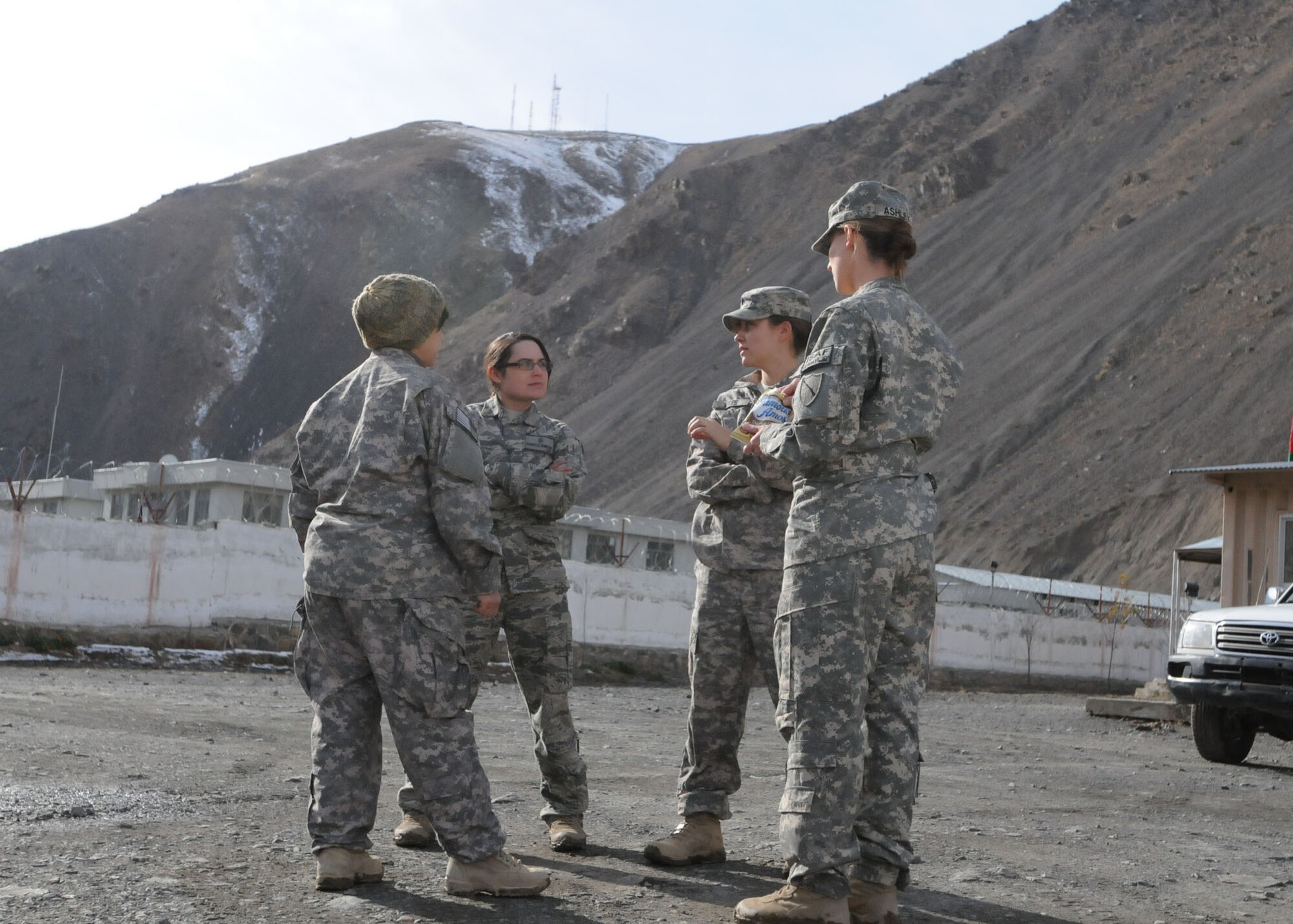 Servicemembers from a Provincial Reconstruction Team at Bagram Airfield, Afghanistan, traveled to Forward Operating Base Lion in the Panjshir Valley to meet with Afghan women there.  Female servicemembers deployed to Forward Operating Base Lion work hand in hand with the local Afghan women, teaching them things like first aid and how to increase their crop output.  (U.S. Air Force photo/Senior Airman Susan Tracy)
